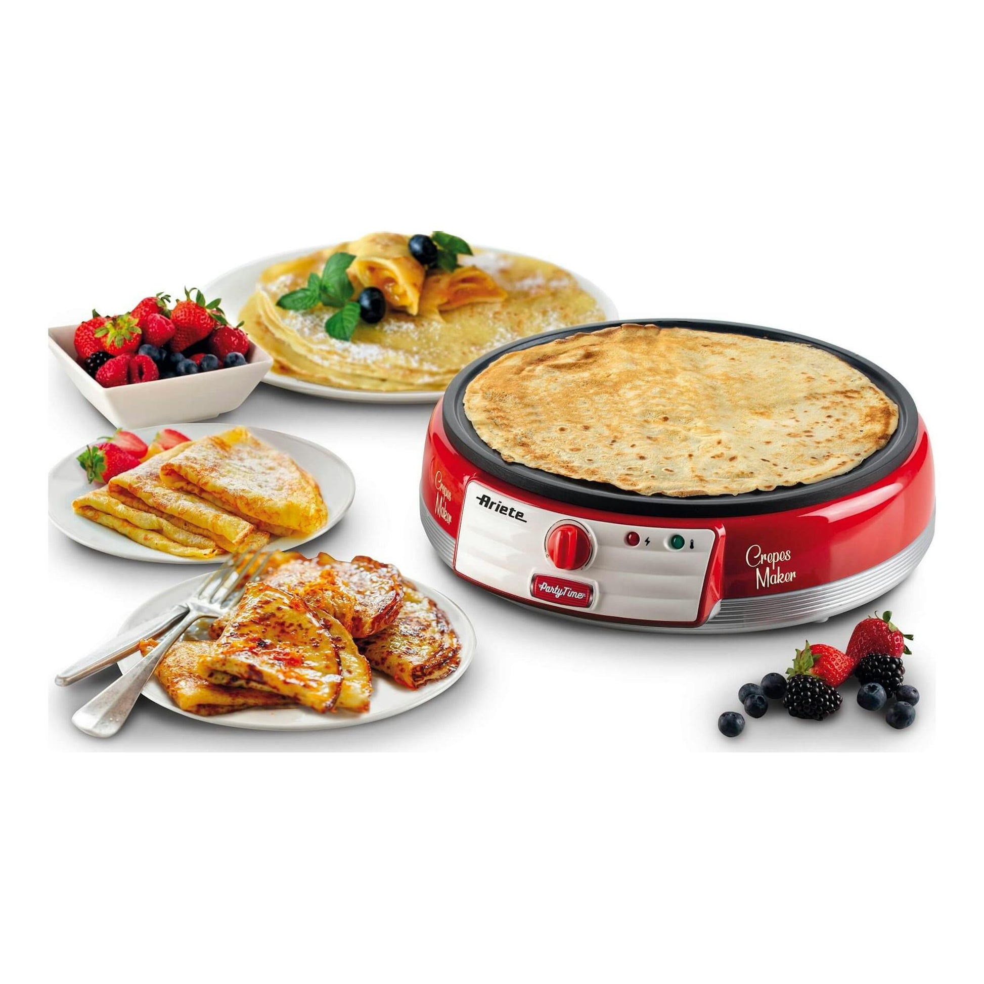 Crepera Ariete Party Time 0202/00 roja, vista frontal, con una crepe sobre la placa y platos de crepes y frutas.