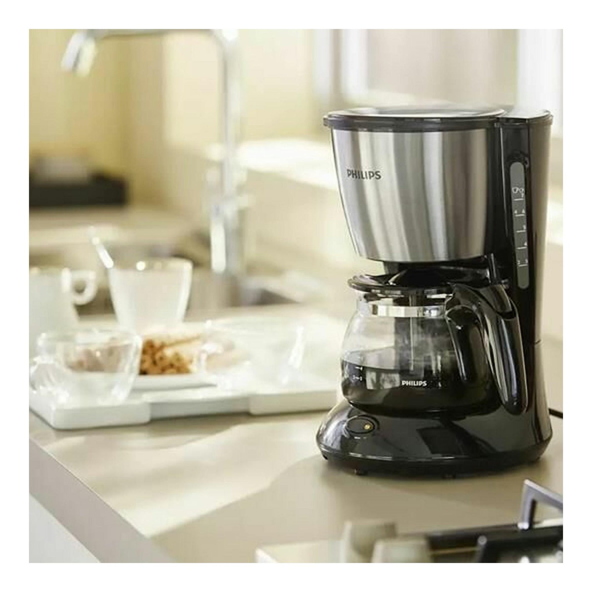 Cafetera de goteo Philips HD7435/20 negra y acero inoxidable, vista frontal sobre encimera.