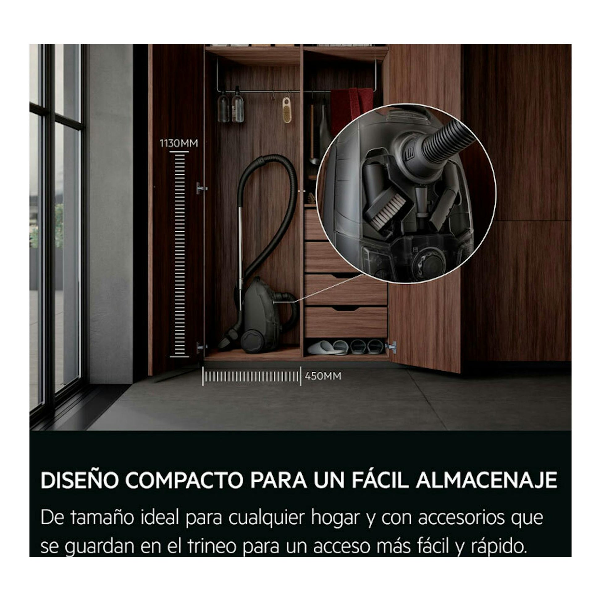 Aspirador AEG AB31C1GG negro en armario de madera, vista frontal con detalle ampliado y medidas.