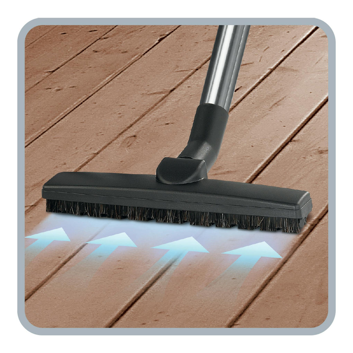 Cabezal de aspiradora Rowenta Compact Power RO3969EA sobre suelo de madera, vista en primer plano.
