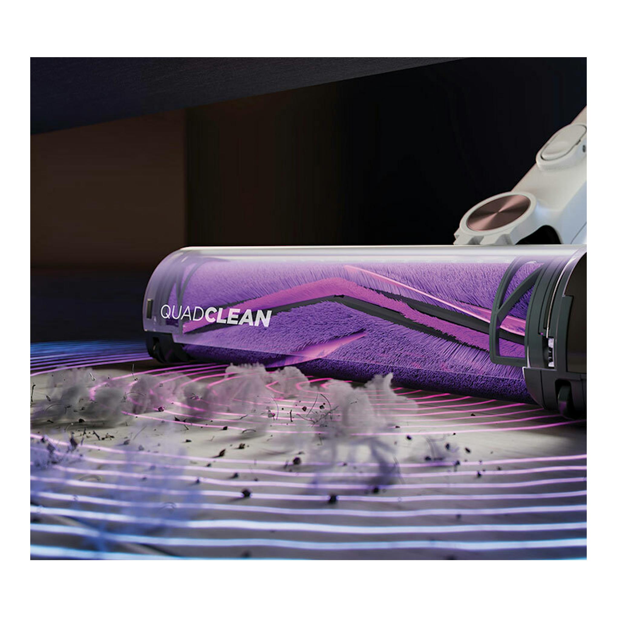 Aspirador escoba Shark IW3611EU, vista en ángulo del cabezal blanco con rodillo morado QuadClean.