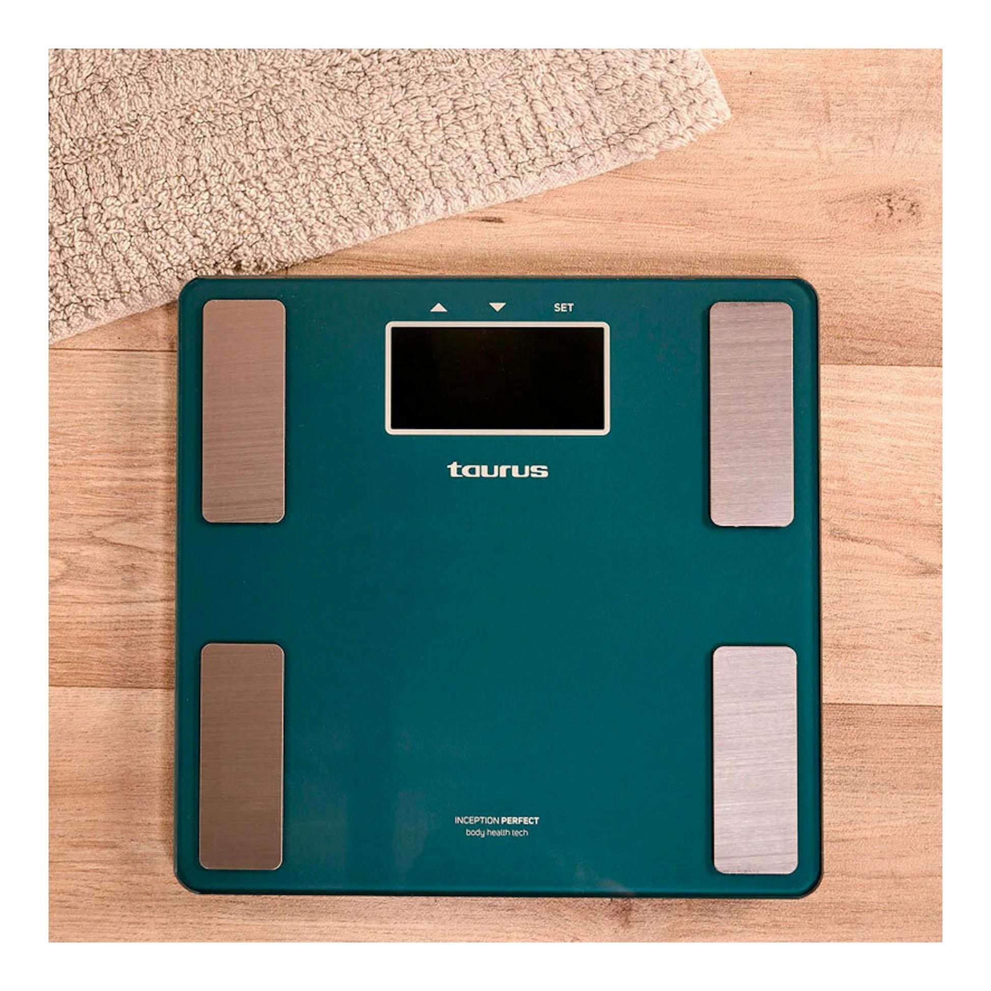 Báscula de baño Taurus Inception Perfect, vista superior, color verde azulado con electrodos plateados.