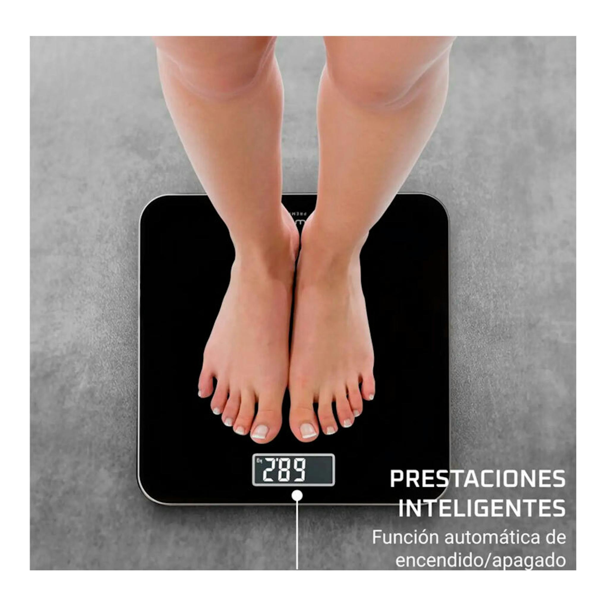 Báscula de baño digital negra Rowenta BS1800V0, vista superior, con pies sobre la superficie.