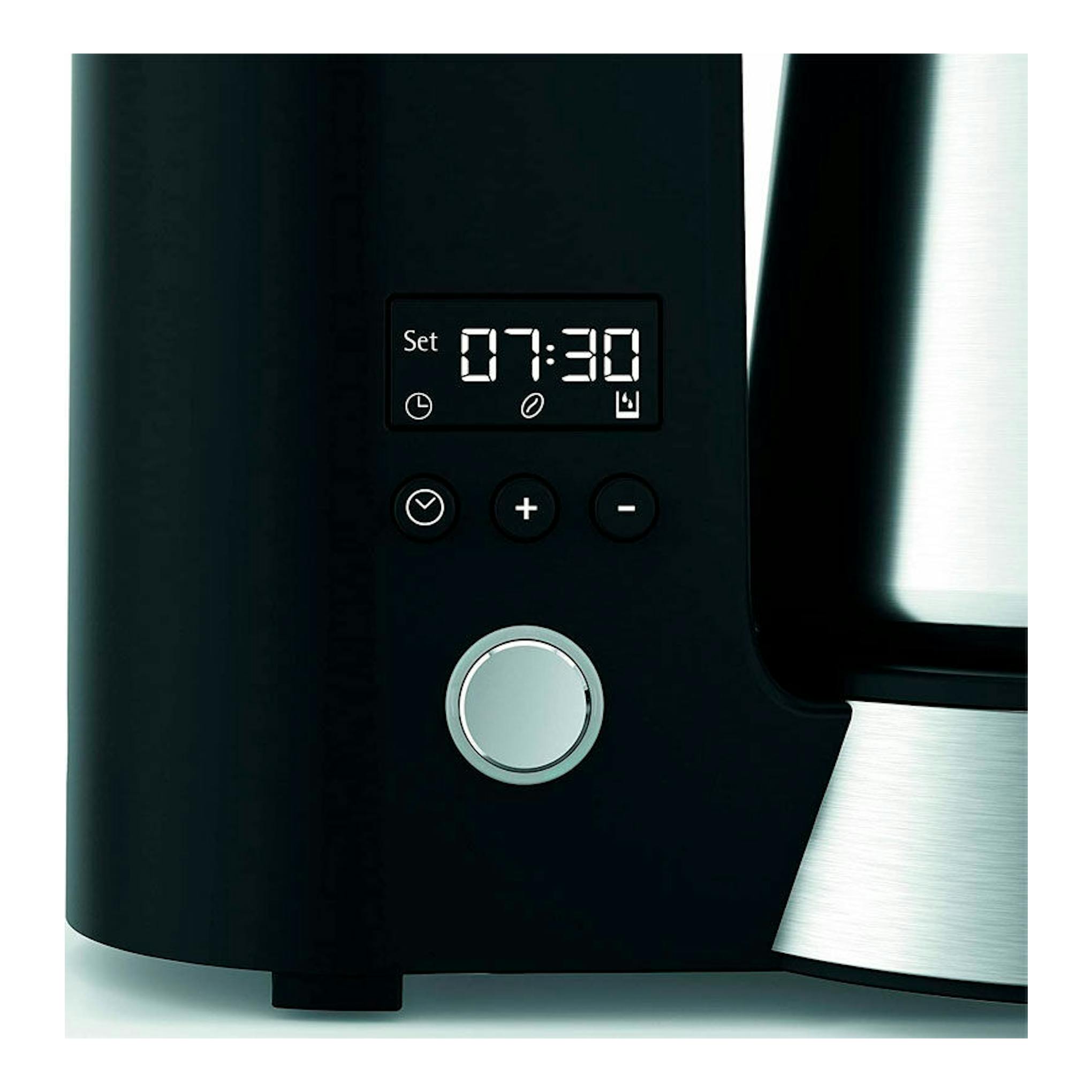 Cafetera de goteo WMF Aroma Termo KITCHENmini, vista frontal parcial en negro y acero, pantalla digital 07:30.