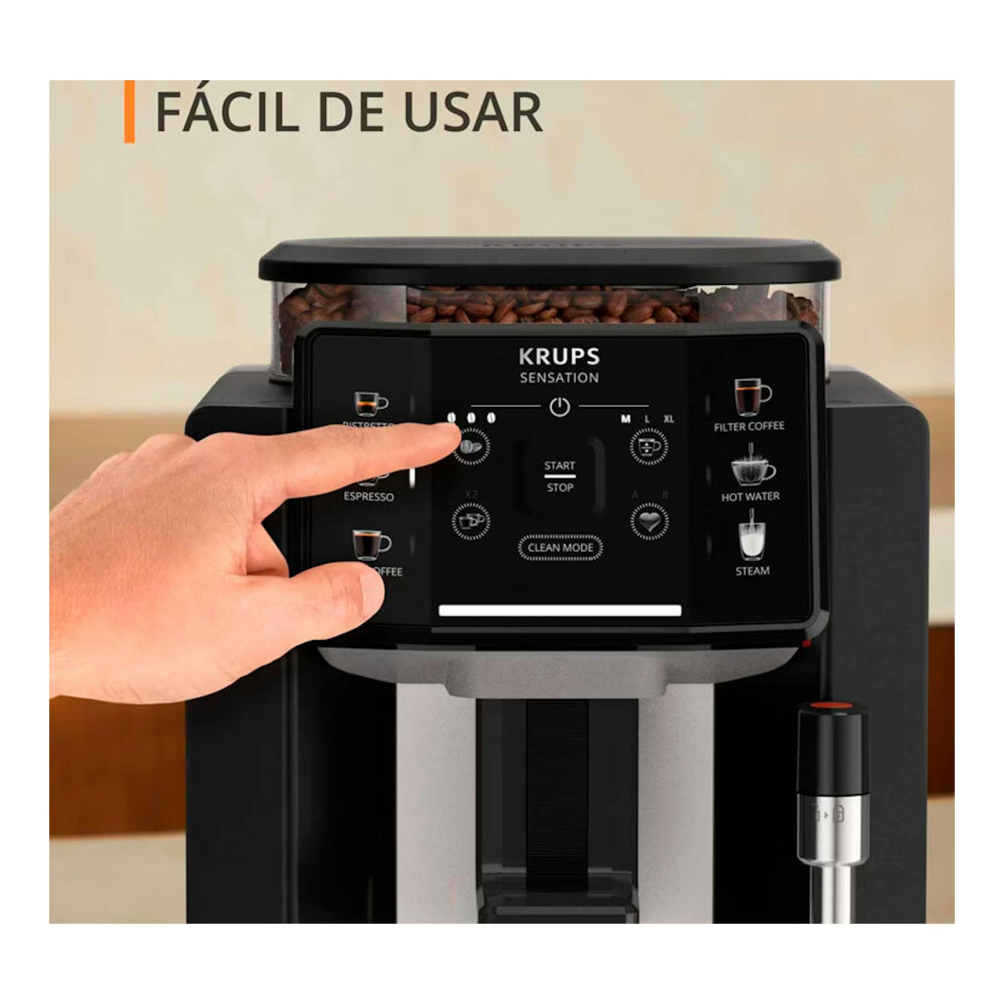 Cafetera superautomática Krups EA910A10 negra, vista frontal, con mano tocando el panel de control.
