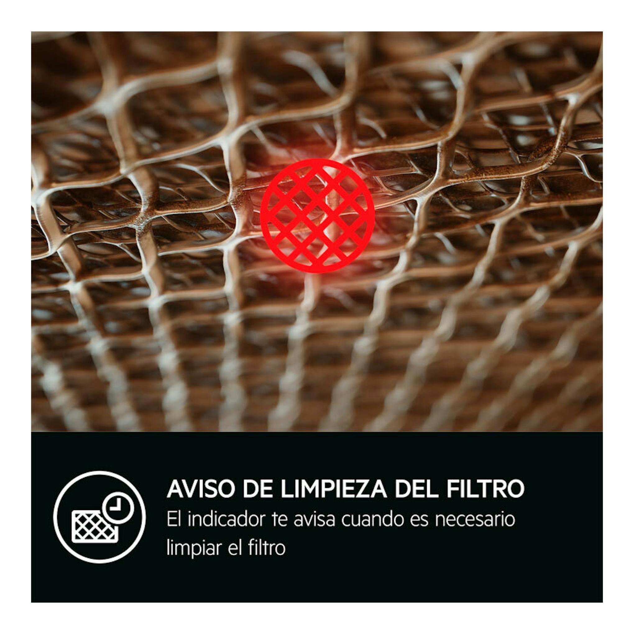 AEG GDE689HM: primer plano del filtro metálico con icono rojo y texto de aviso de limpieza.