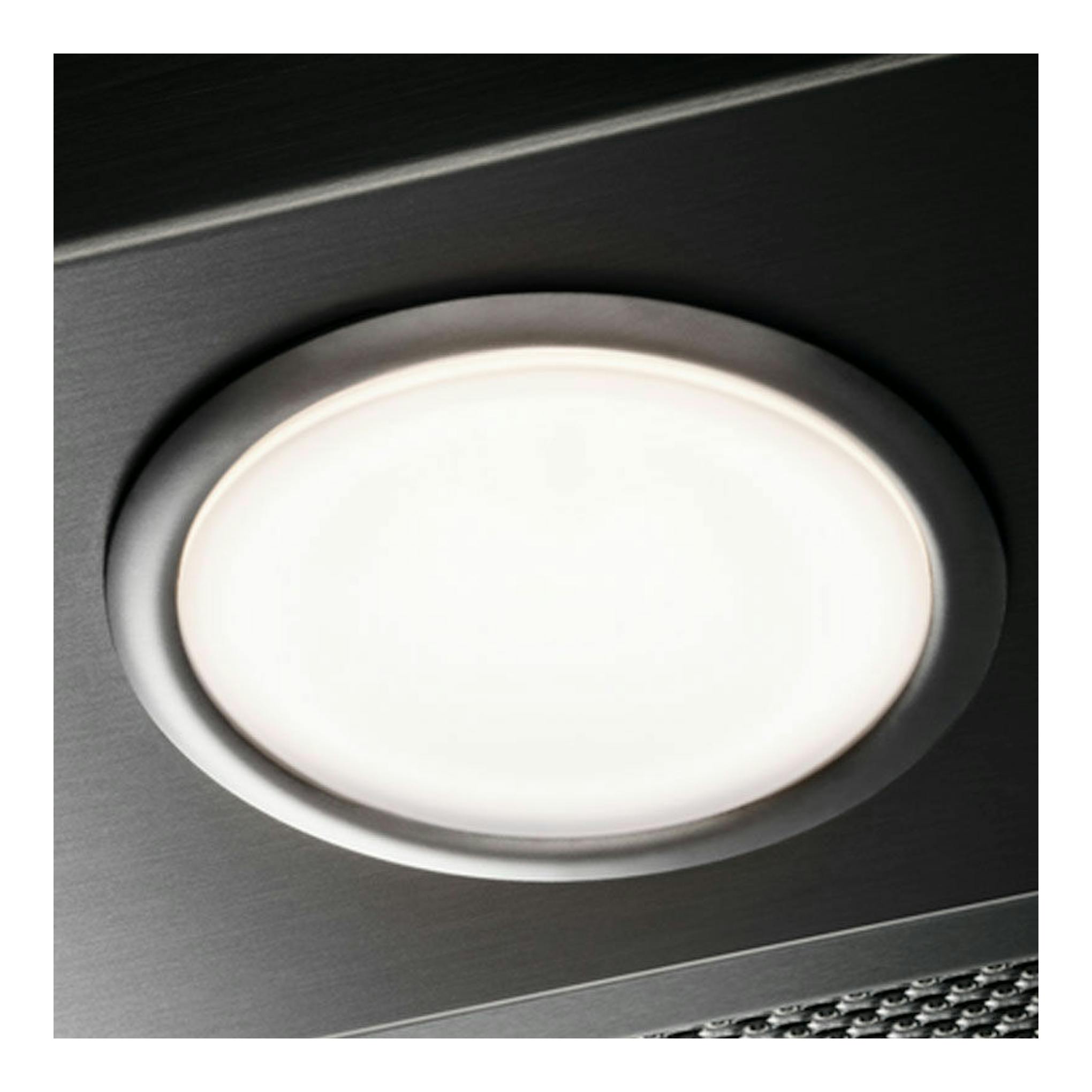 Campana integrada Electrolux EFP129X inox, vista en detalle del foco circular sobre acero inoxidable.