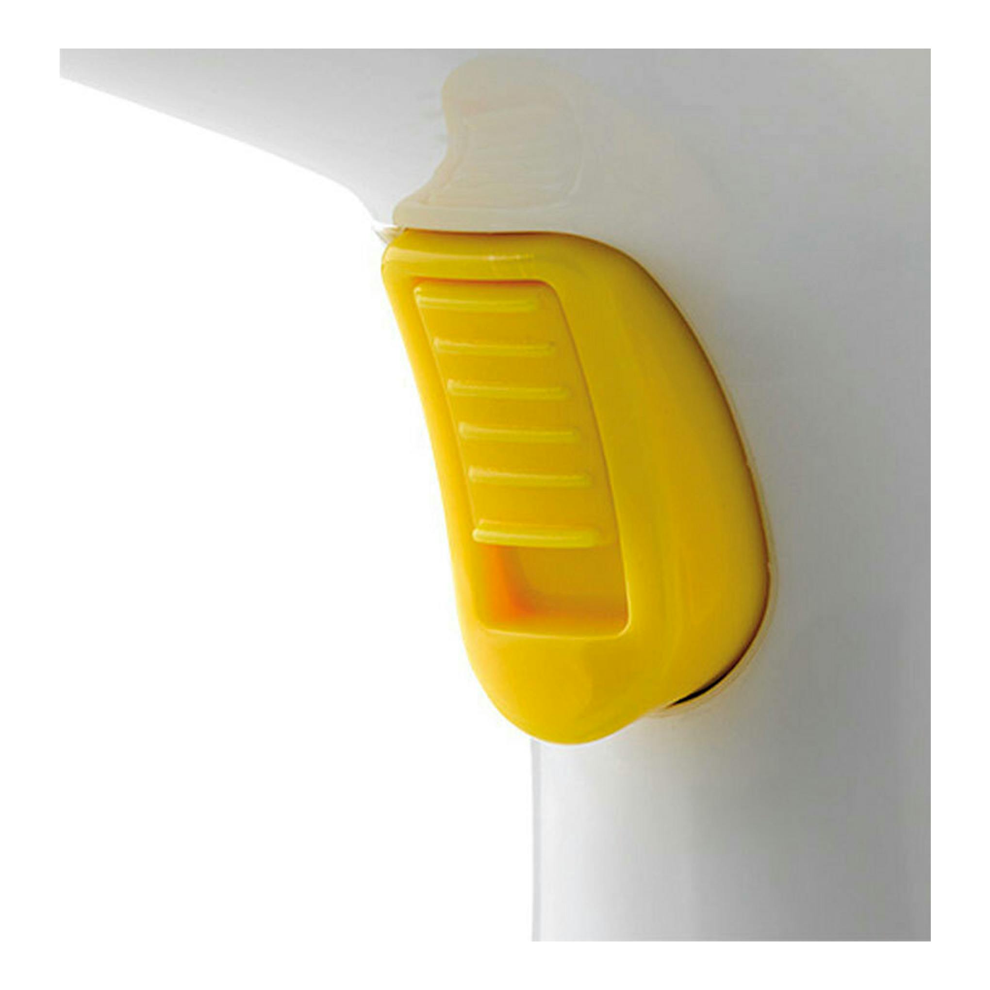 Detalle en primer plano de un cepillo de vapor de mano Ariete blanco con pieza amarilla lateral.