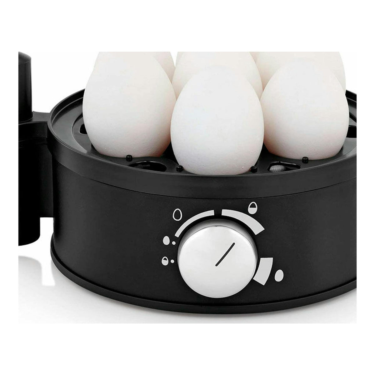 Cocedora de huevos WMF STELIO negra, vista frontal, con seis huevos y mando giratorio.