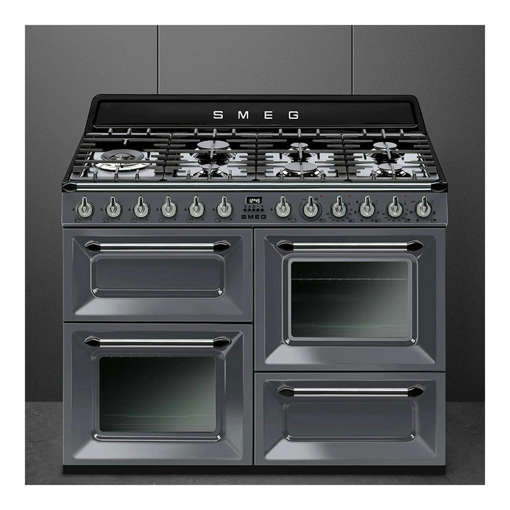 Cocina Smeg TR4110GR gris grafito, vista frontal, con seis quemadores y cuatro hornos.