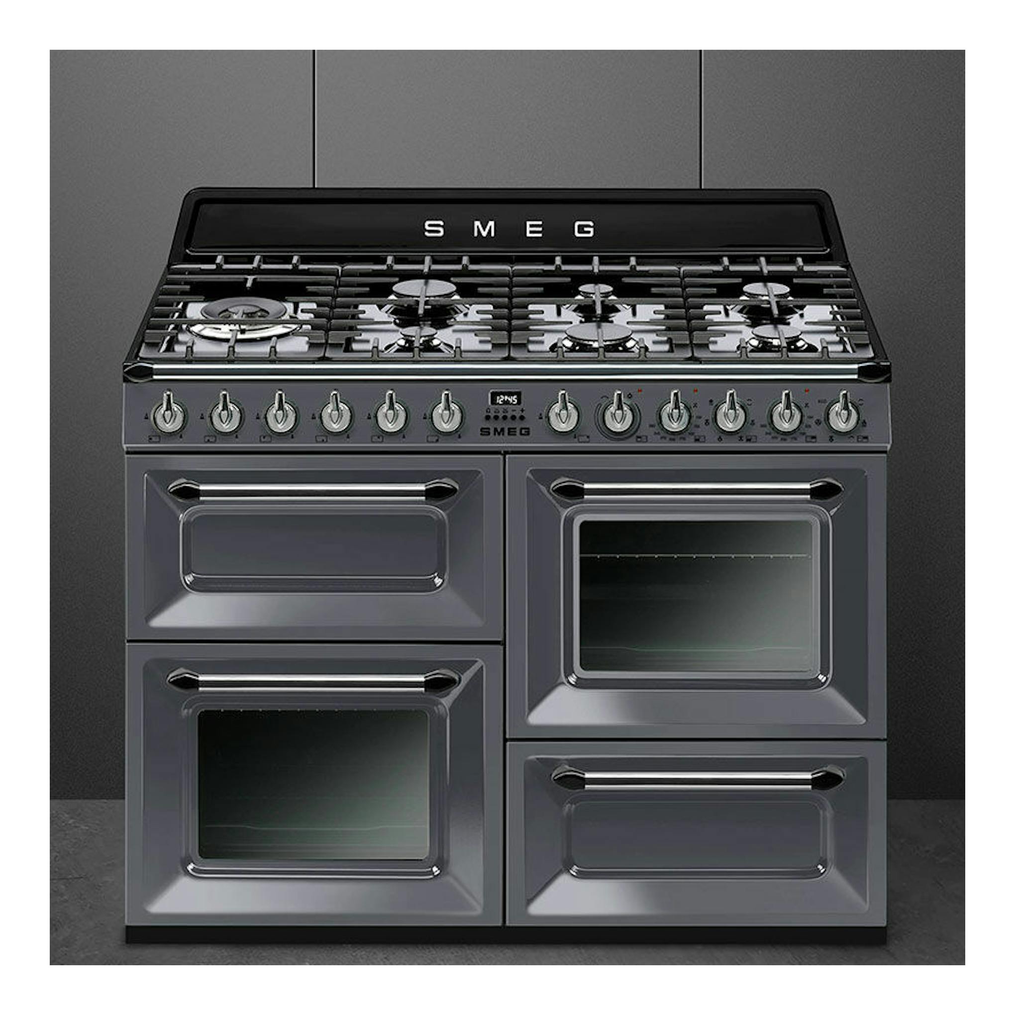Cocina Smeg TR4110GR gris grafito, vista frontal, con seis quemadores y cuatro hornos.