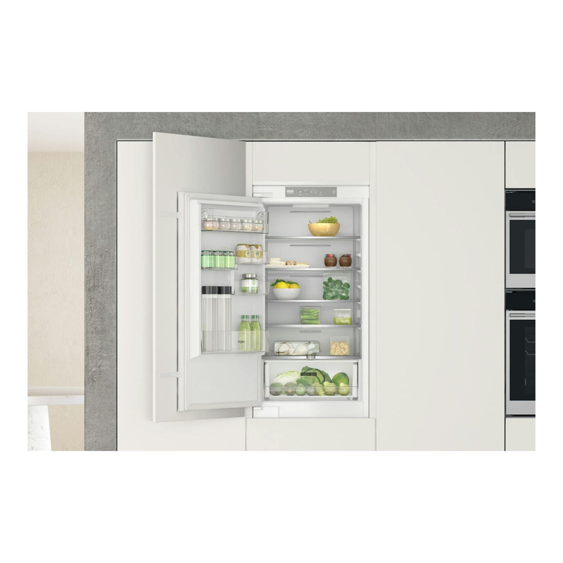 Frigorífico combi Whirlpool WHC18 T311 integrable, blanco, con la puerta abierta y el interior visible.