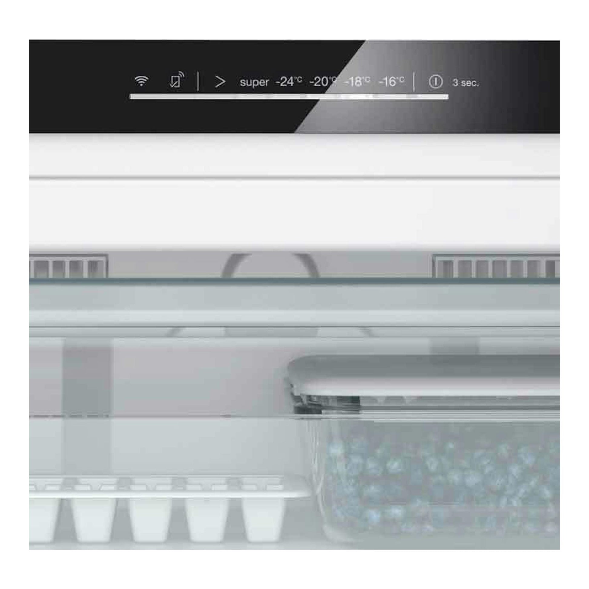 Congelador integrable Siemens GU21NADE0, vista frontal del interior con panel digital superior y cajón transparente.