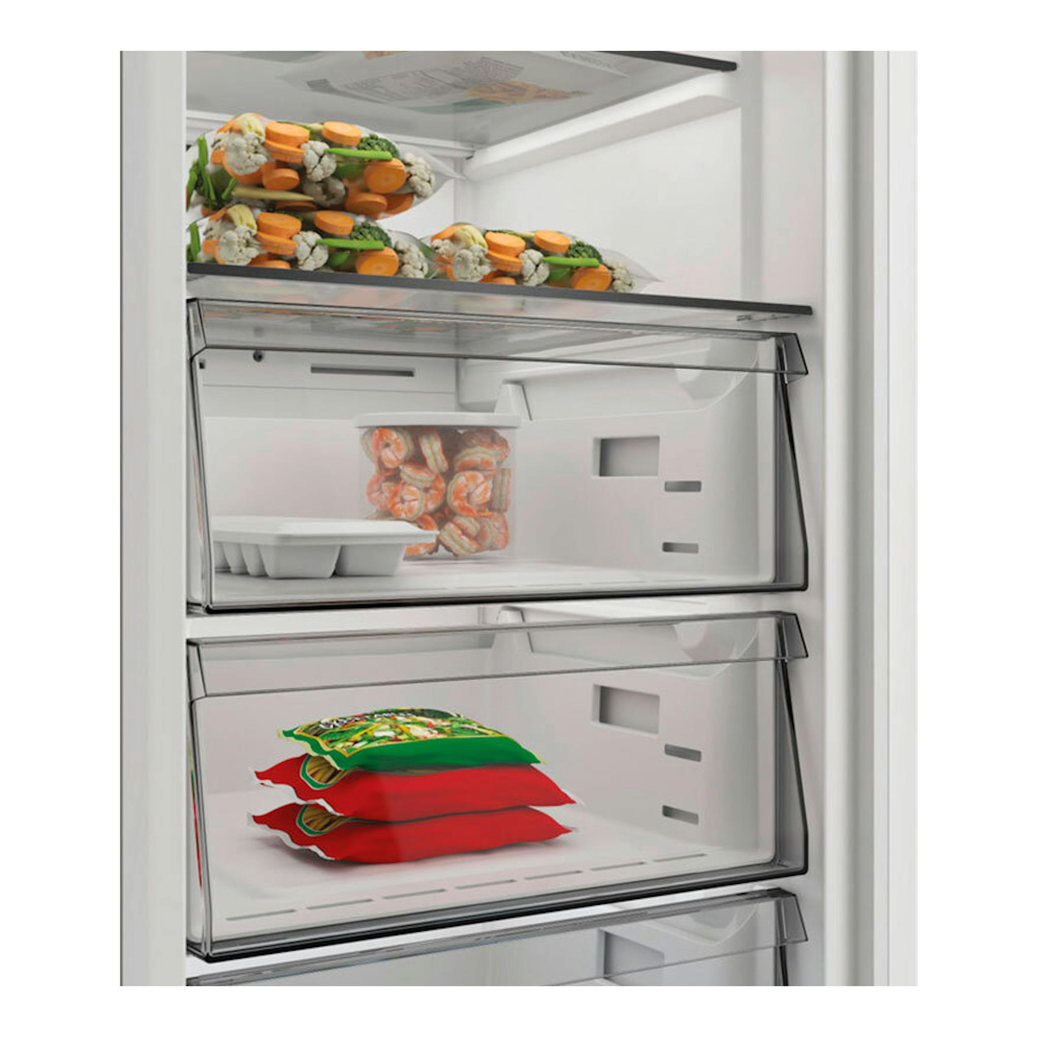 Interior de congelador Whirlpool WHMFF 6312 W4E blanco, con cajones y alimentos congelados.