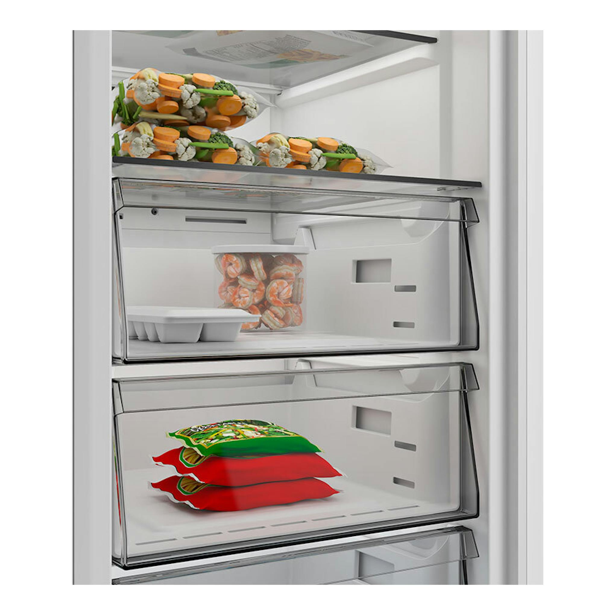 Interior de congelador Whirlpool WHMFF 6312 XP4 Inox con cajones transparentes y alimentos congelados.
