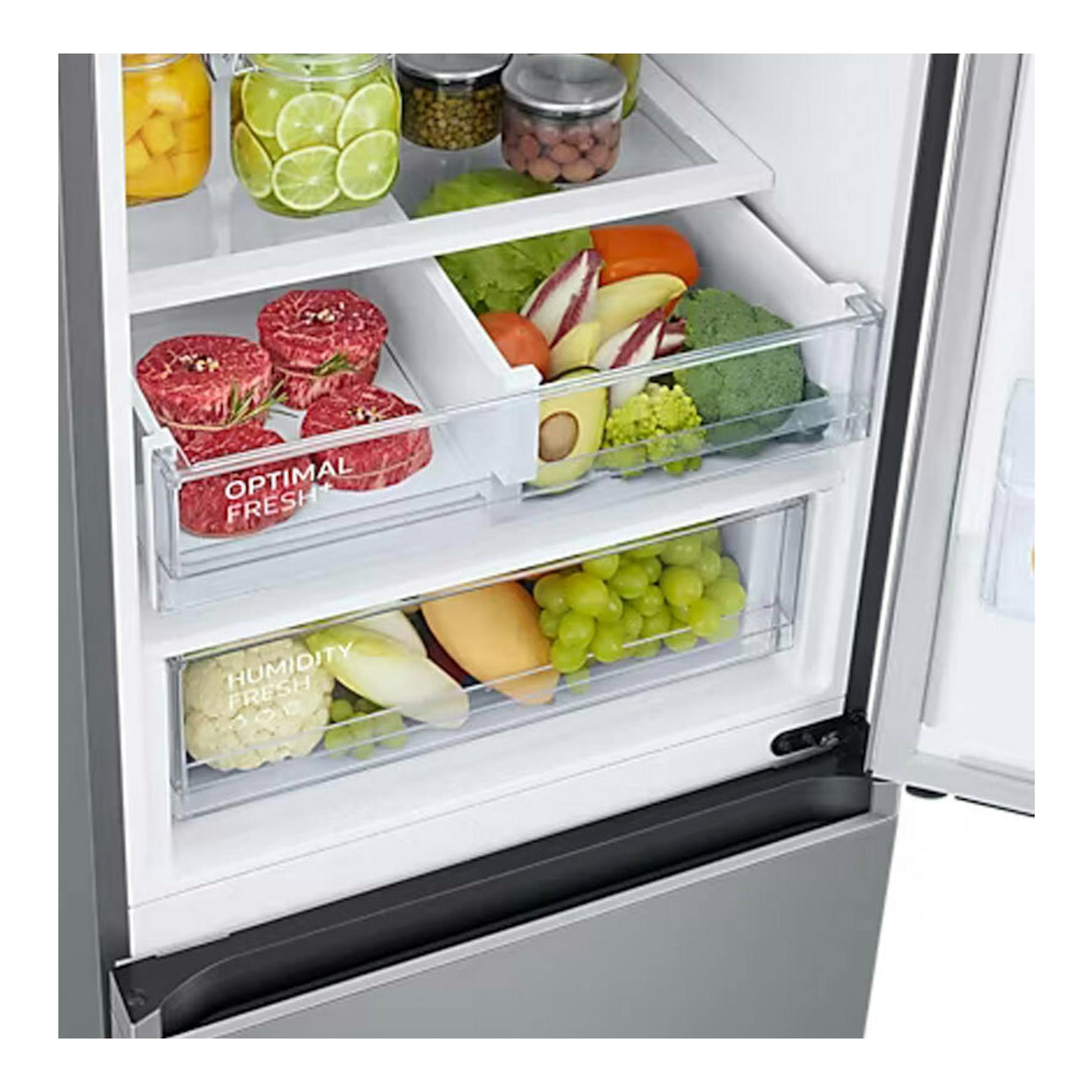 Interior de frigorífico combi Samsung RB38C607AS9/EF, vista frontal, con cajones transparentes y frutas y verduras.