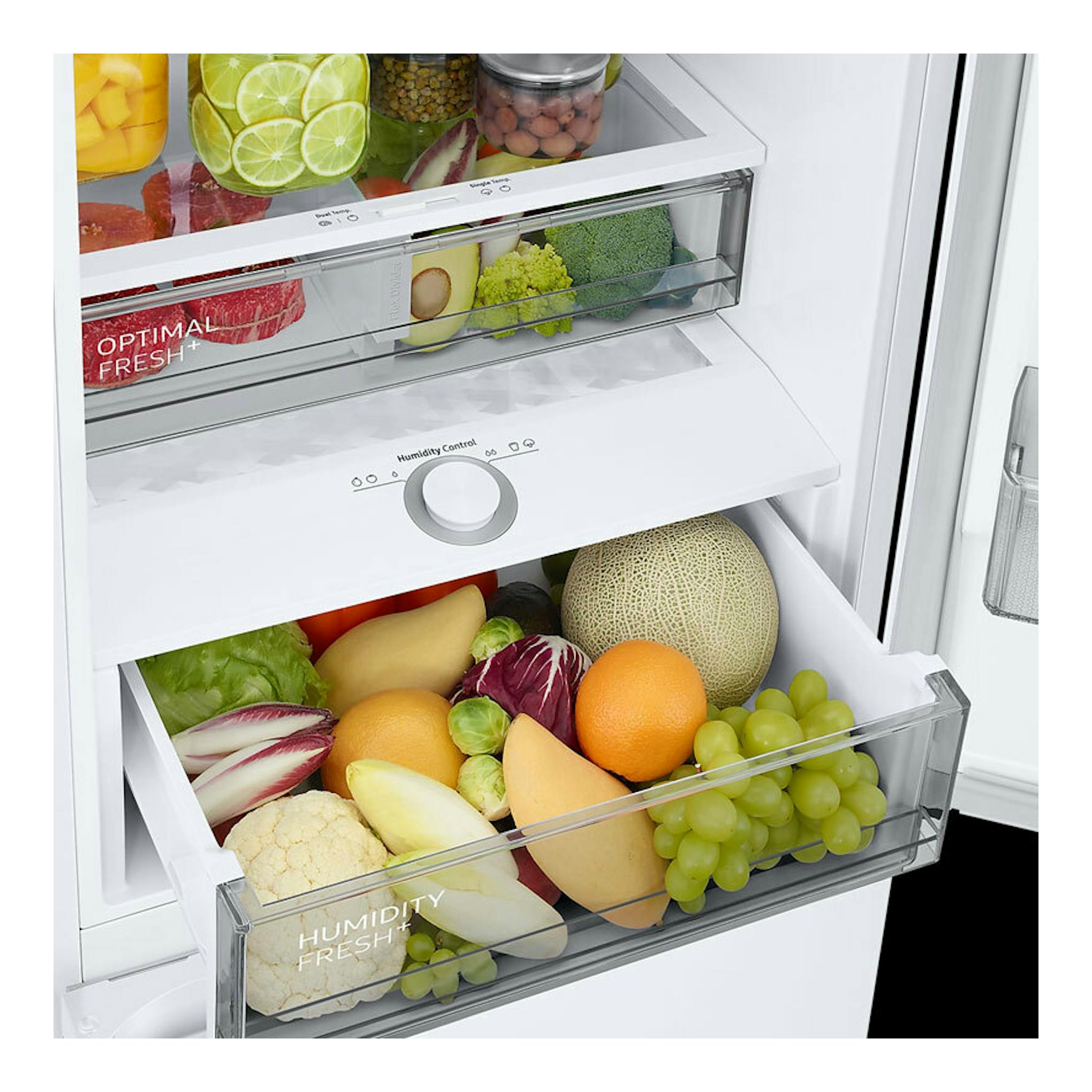 Interior de frigorífico combi Samsung RB38C705CWW/EF blanco con cajones llenos de frutas y verduras.