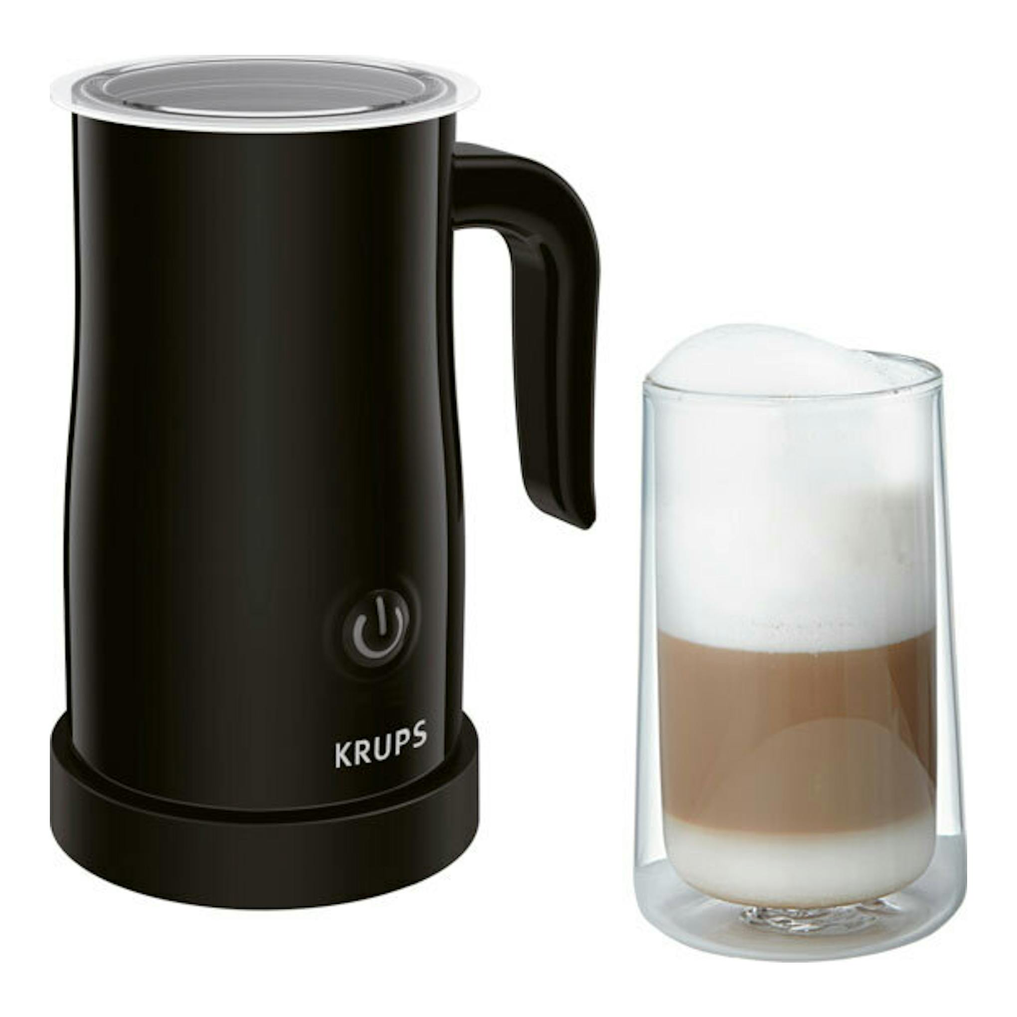 Espumador de leche Krups XL100810 negro, vista frontal, junto a un vaso con leche espumada.