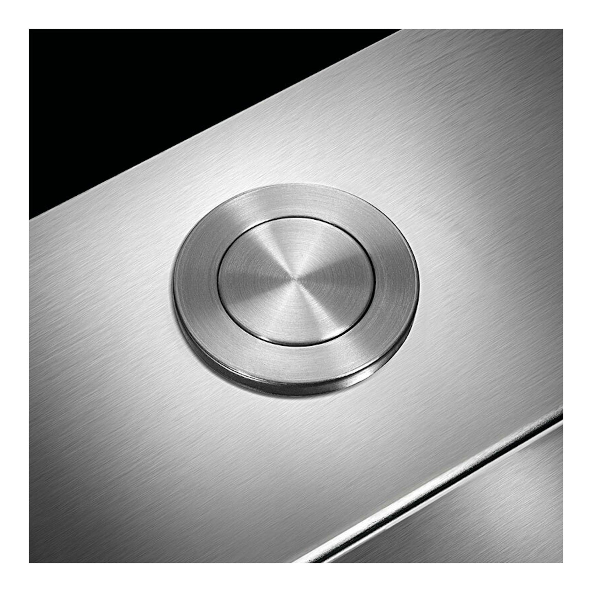Fregadero Smeg VR12S50 de acero inoxidable, vista en diagonal, con desagüe circular integrado.
