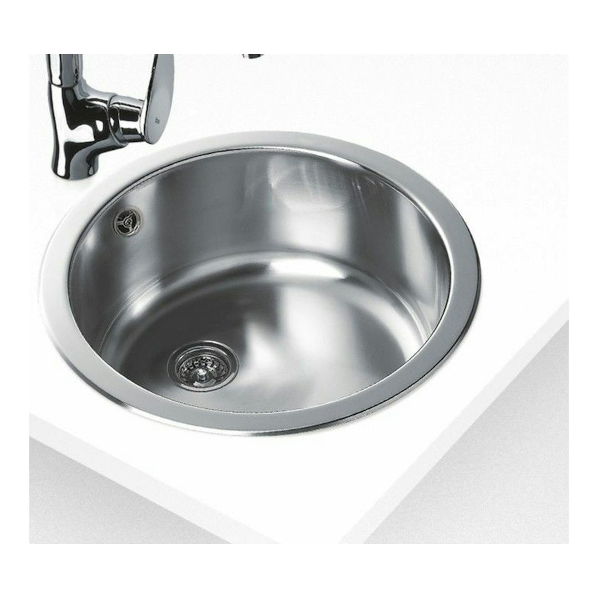 Fregadero Teka ERC 45 1C de acero inoxidable, vista superior, empotrado en encimera blanca.