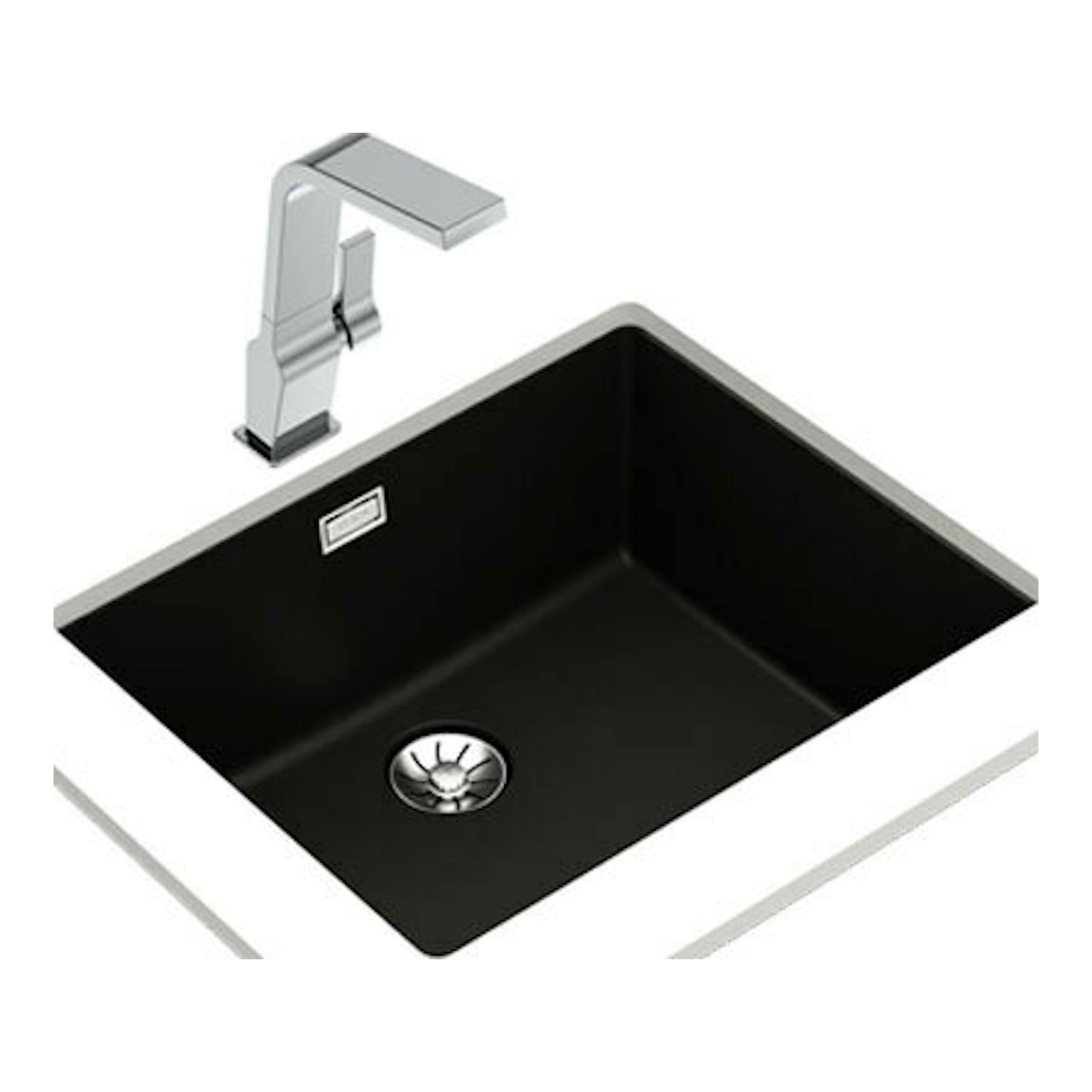 Fregadero Teka Tegranite RADEA R10 50.40 M-TG negro, vista superior, con grifo cromado sobre encimera blanca.