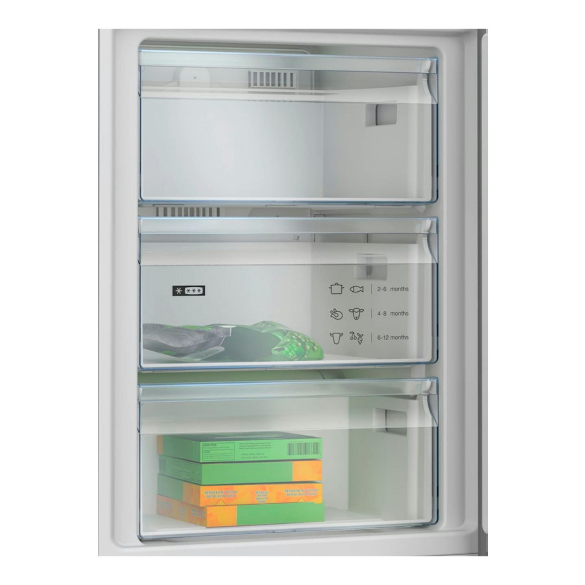 Interior del congelador de un frigorífico combi Balay 3KFD655BI blanco, con tres cajones abiertos, vista frontal.
