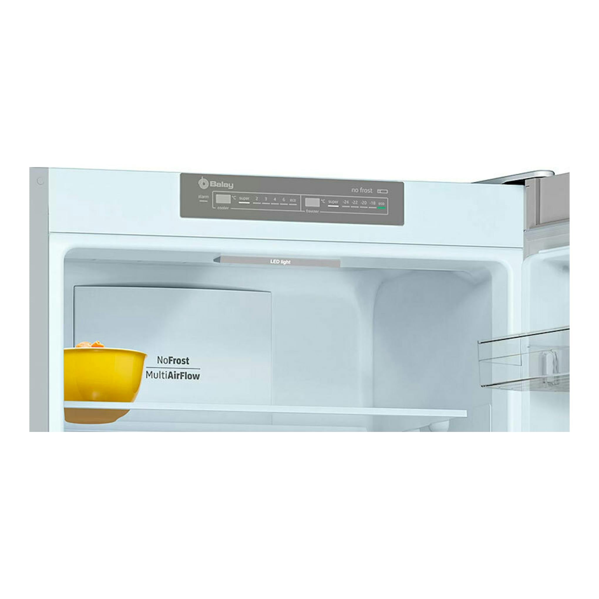 Frigorífico combi Balay 3KFE763XI inox, puerta abierta, vista frontal del interior blanco y panel digital.