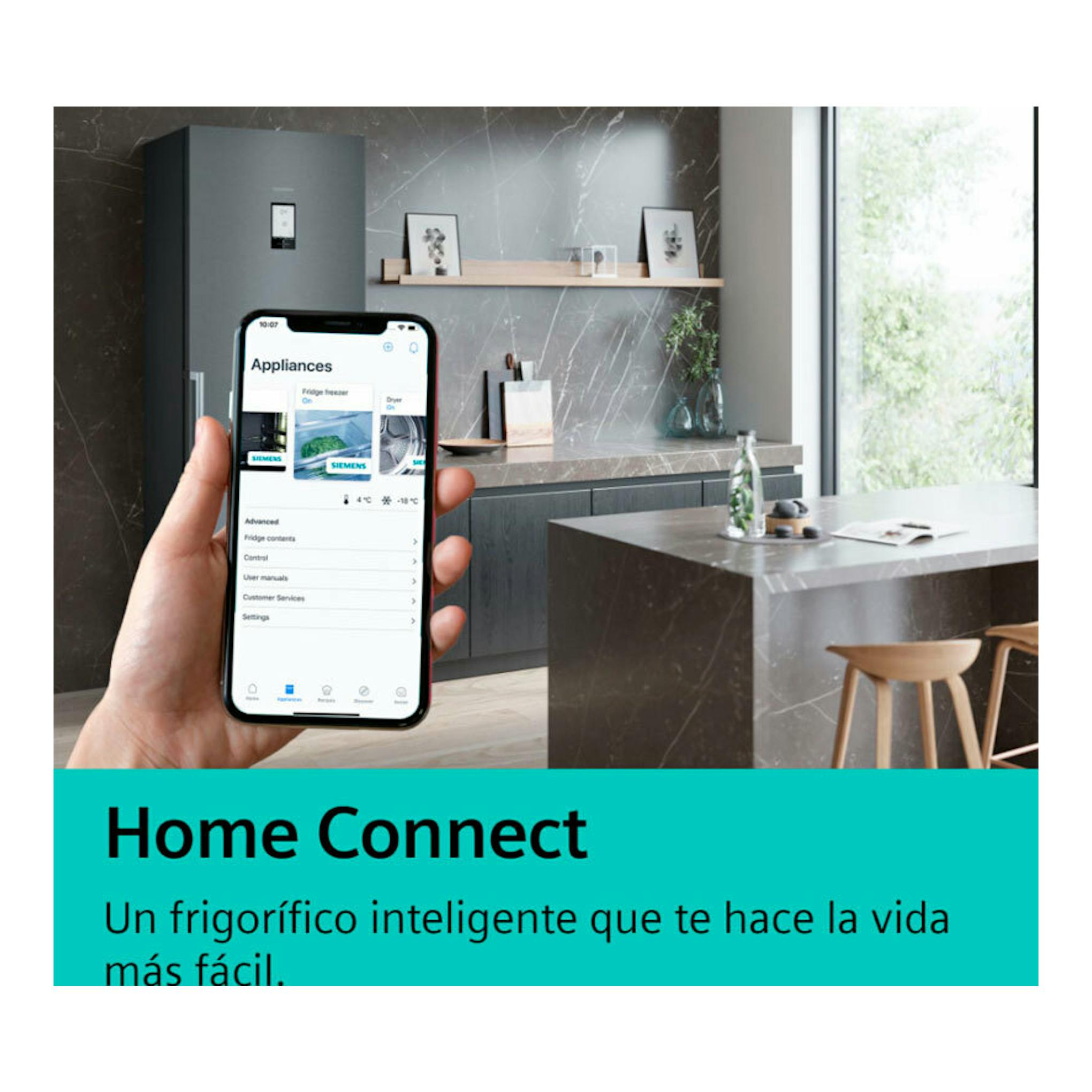 Frigorífico combi integrable Siemens KB96NVSE0 gris oscuro, visto de frente, con móvil mostrando Home Connect.