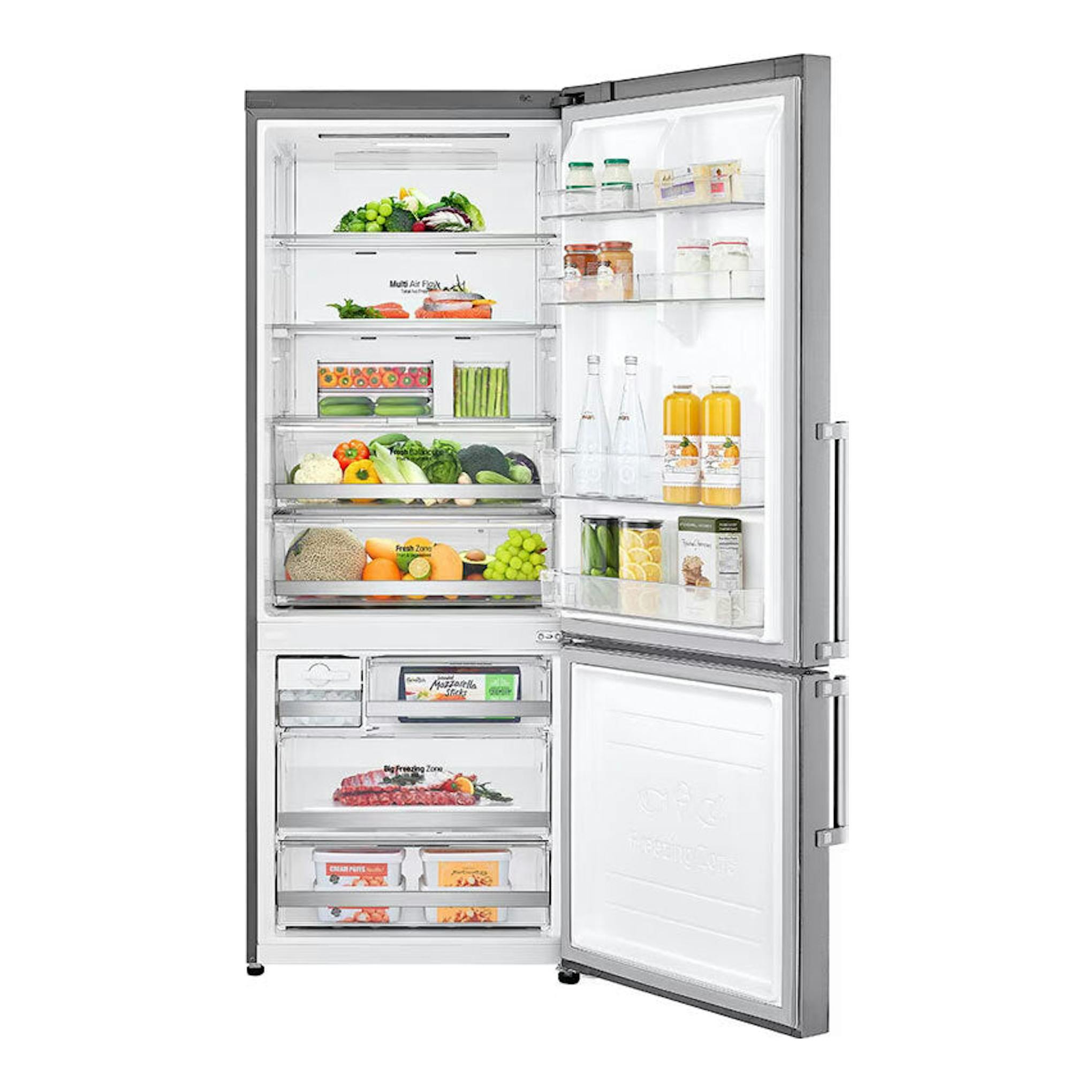 Frigorífico combi LG GBB569NSAFB inox, abierto de frente, con interior visible y alimentos en estantes.