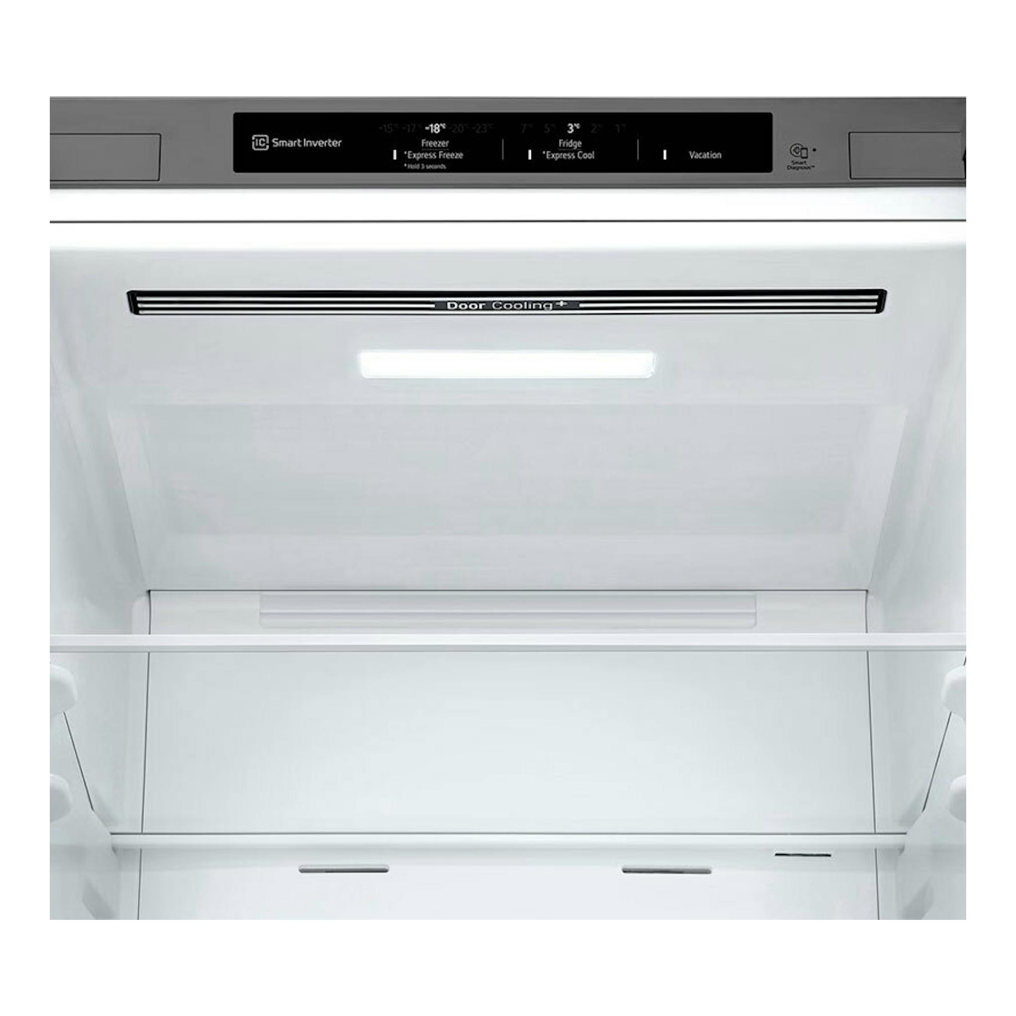 Frigorífico combi LG GBV21NCDPY inox, vista interior frontal, vacío, con panel superior y luz.