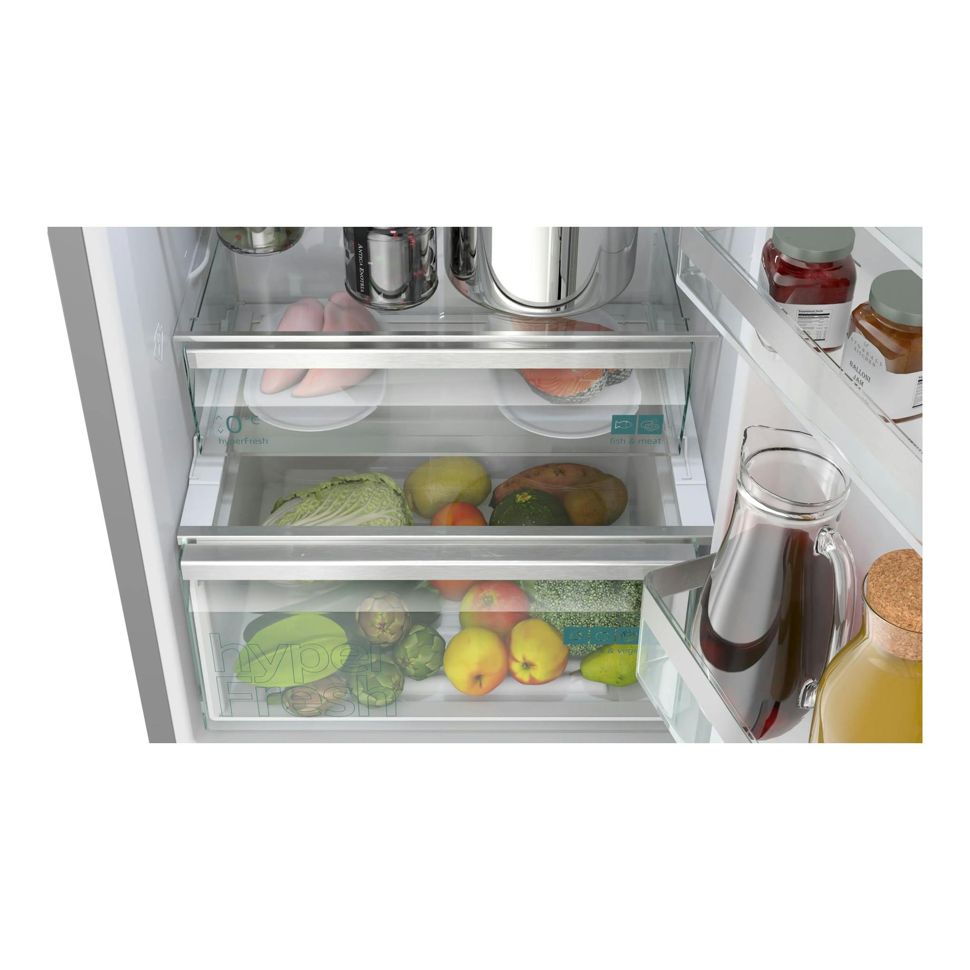 Interior de frigorífico Siemens KG36NVIDG en inox, con cajones transparentes y alimentos, vista frontal.