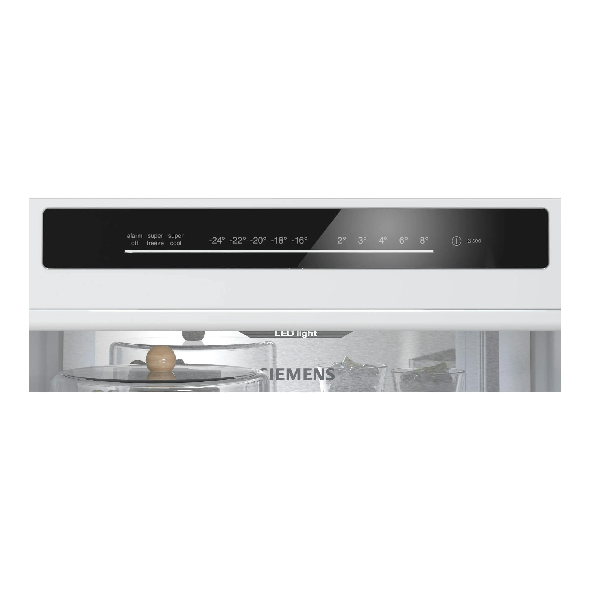 Frigorífico combi Siemens KG36NVWDG blanco, vista frontal del panel táctil y parte del interior con luz LED.