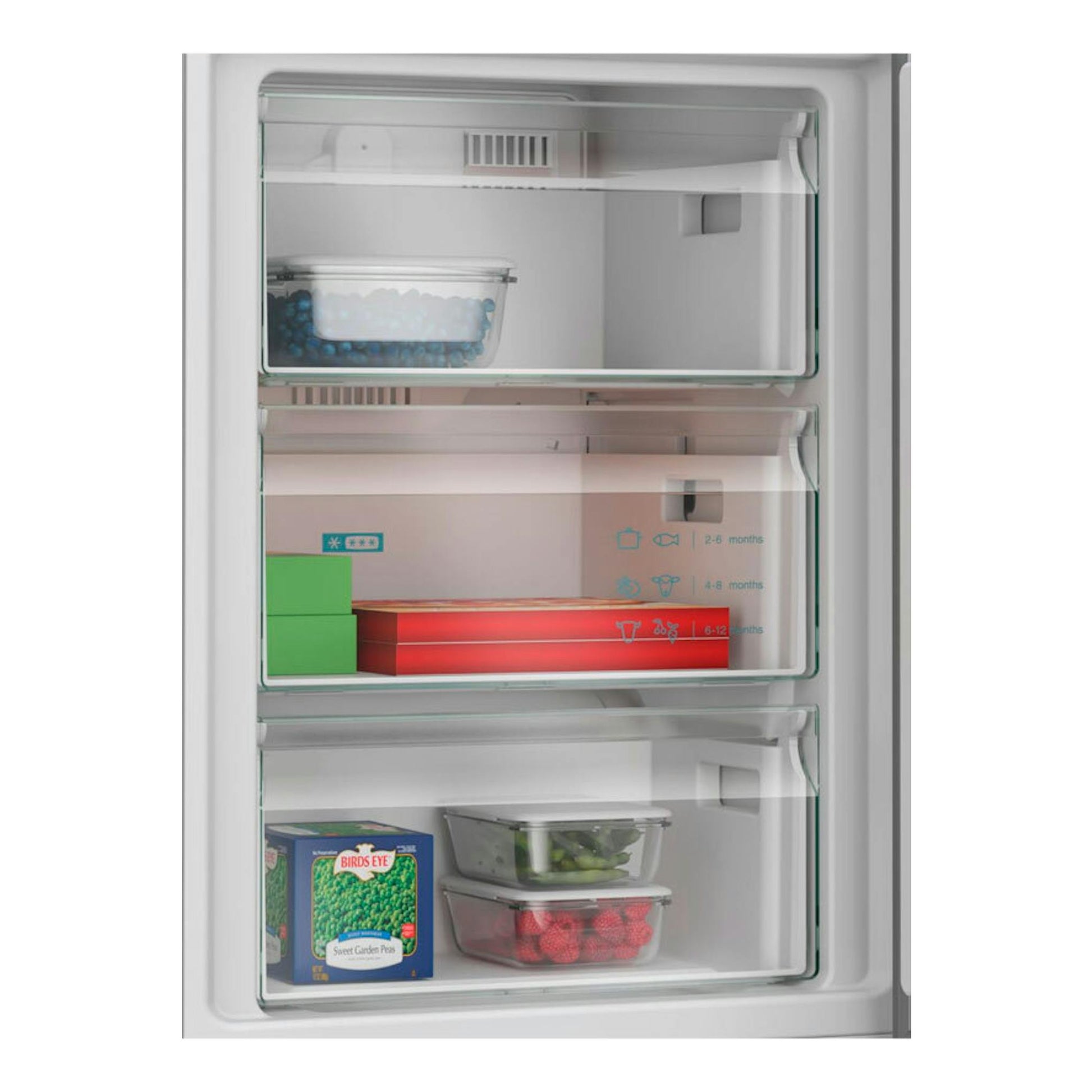 Siemens KG36NXIDF Inox, interior abierto del congelador con tres cajones y alimentos, vista frontal.