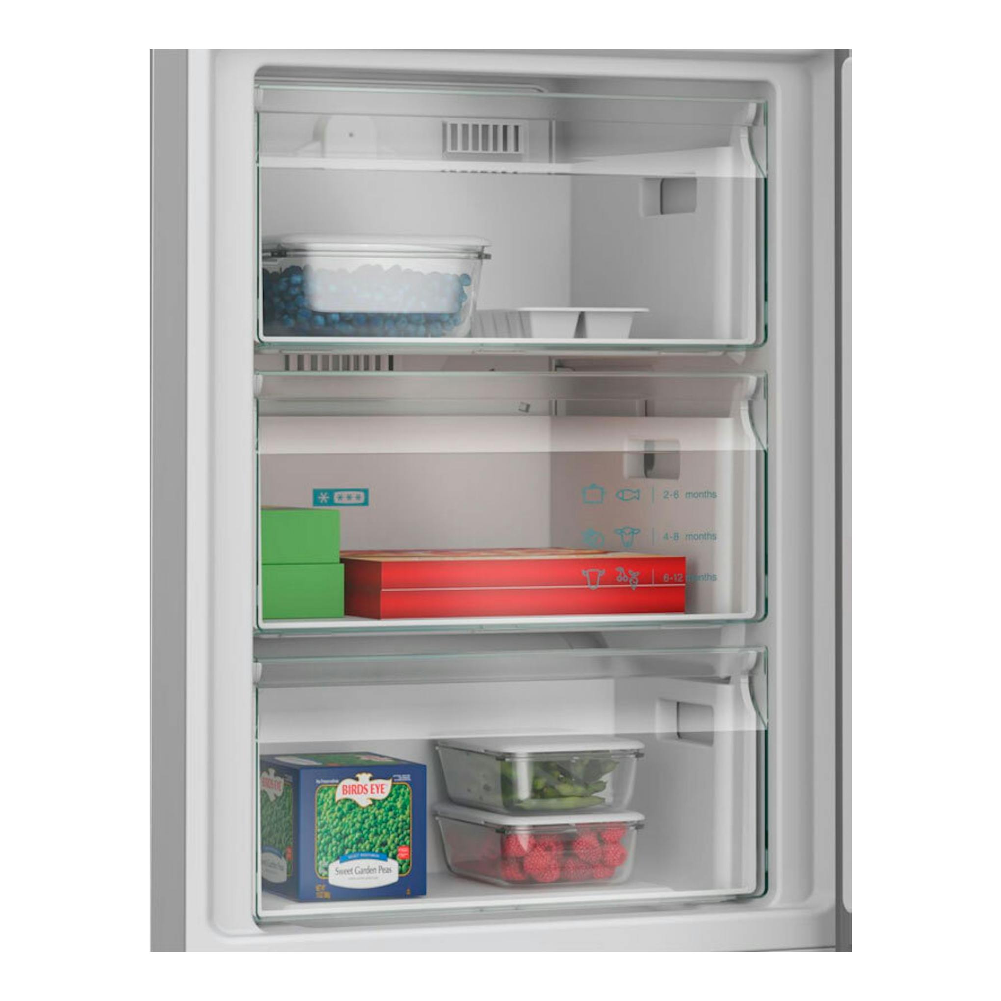 Interior del congelador de un frigorífico combi Siemens KG39NVIDG, con tres cajones transparentes y alimentos.