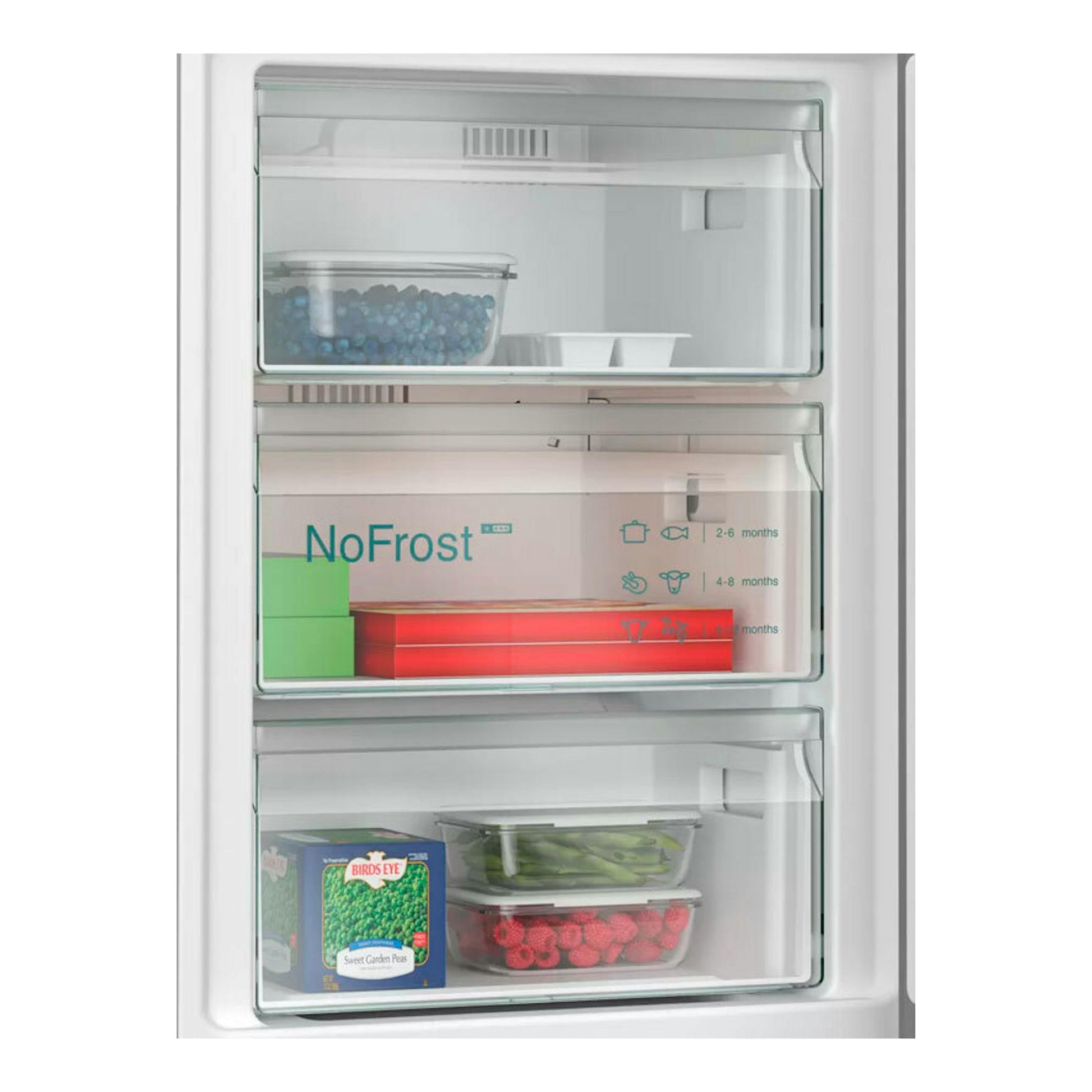 Interior de frigorífico combi Siemens KG39NXIBF Inox, vista frontal con cajones NoFrost y alimentos.