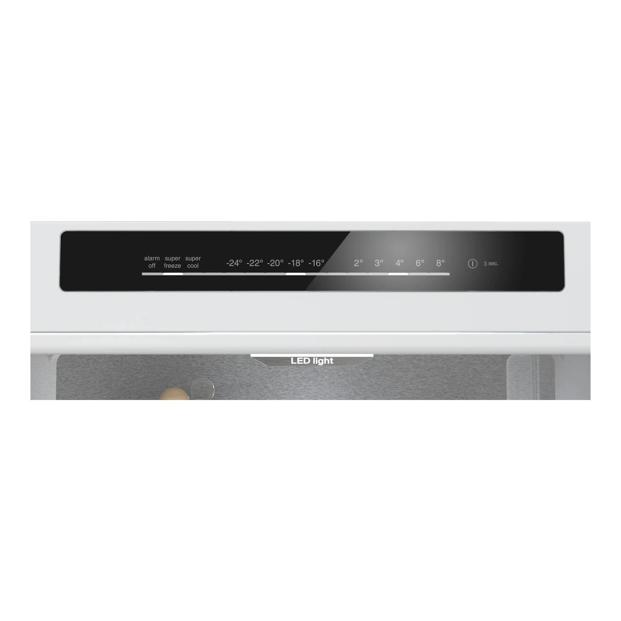 Frigorífico combi Siemens KG49NVWDG blanco, panel de control negro en vista frontal.