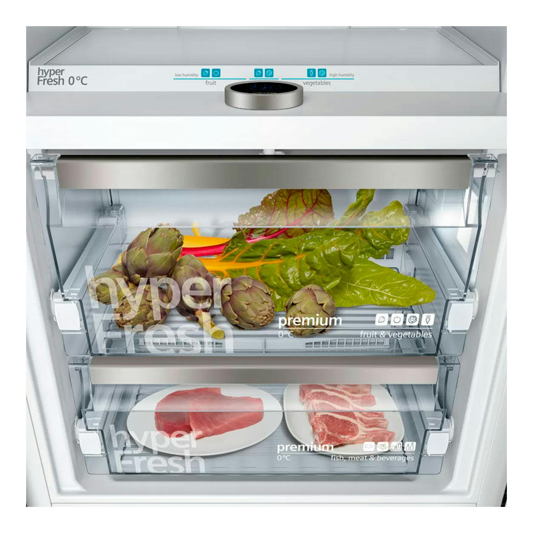 Interior de frigorífico combi Siemens KI86FPDD0, vista frontal de cajones de cristal con verduras y carne.