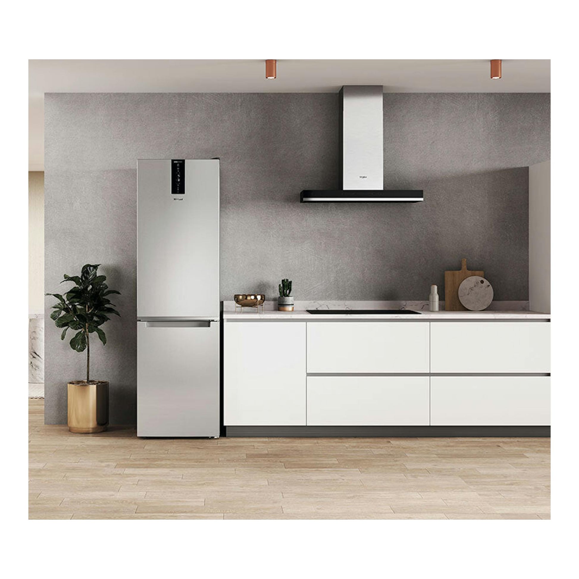 Frigorífico combi Whirlpool W7X94TSX inox, vista frontal, junto a muebles blancos en cocina moderna.