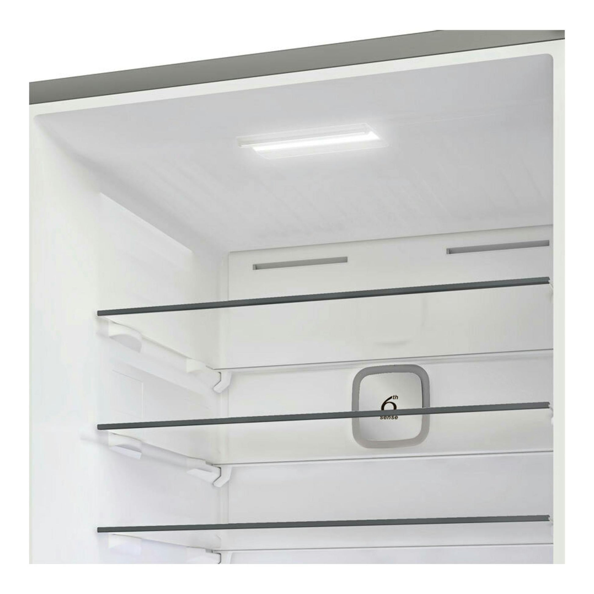 Interior de frigorífico Whirlpool WHK26493X5E inox, vista frontal con baldas de cristal y luz superior.