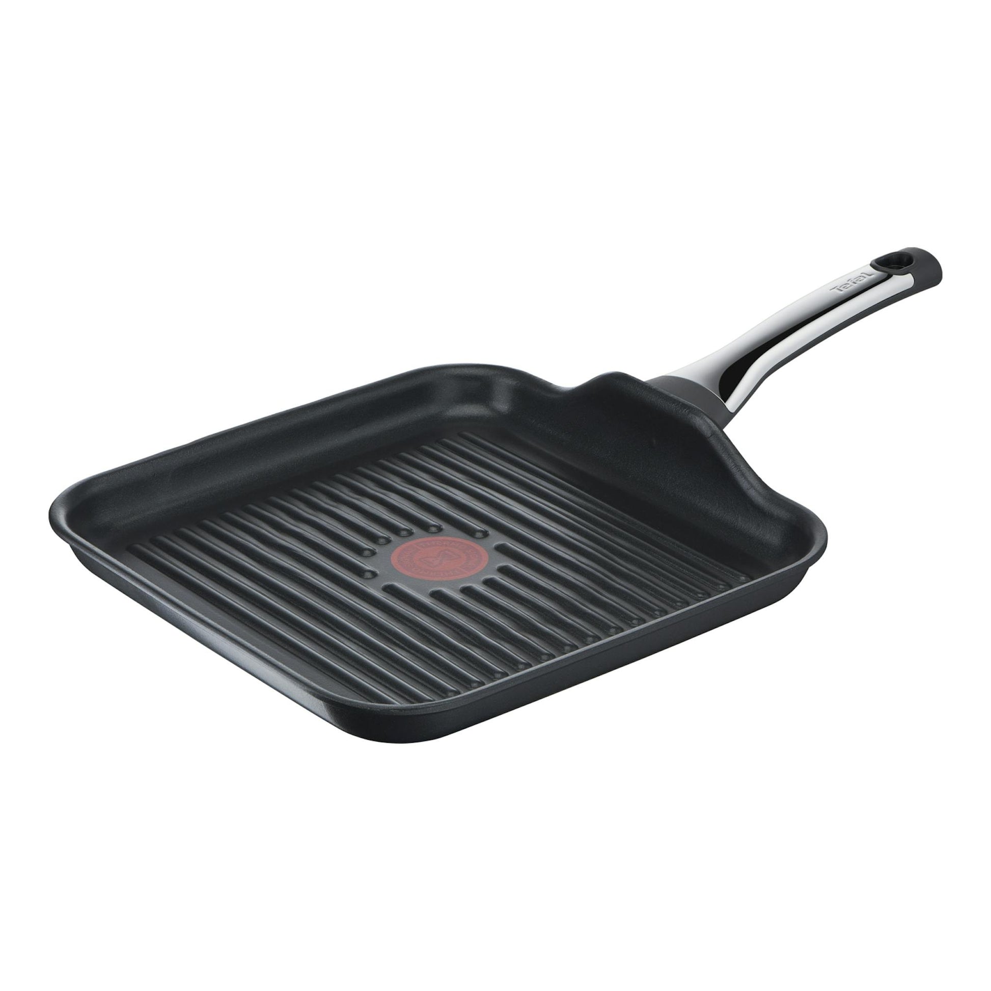 Sartén grill Tefal G85040 negra, vista en ángulo sobre fondo blanco, con mango plateado y negro.