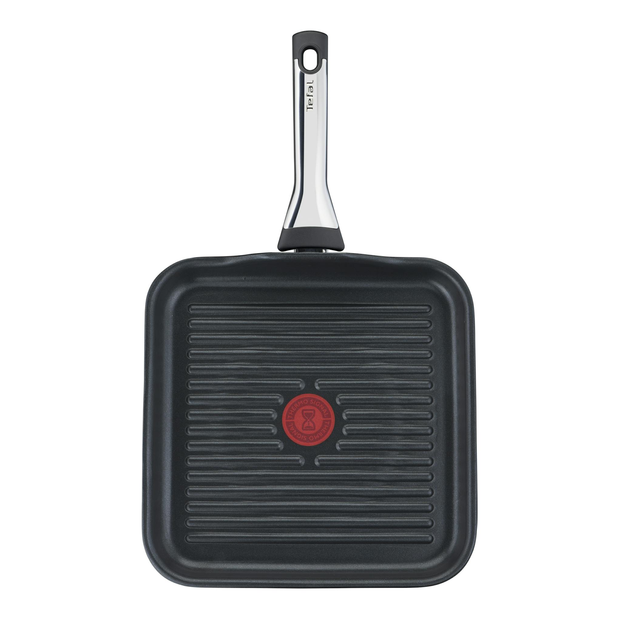Sartén grill Tefal G85040 Excellence negra, vista frontal, con mango metálico y superficie estriada.