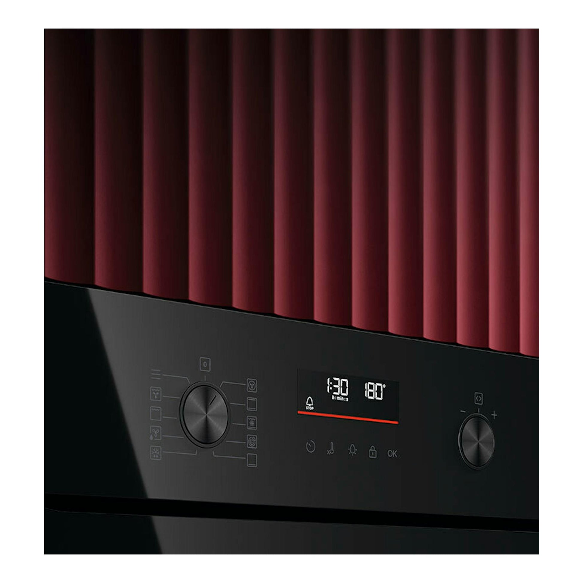 Horno AEG OU5PB40NSK de cristal negro, vista frontal parcial del panel con dos mandos y display digital.