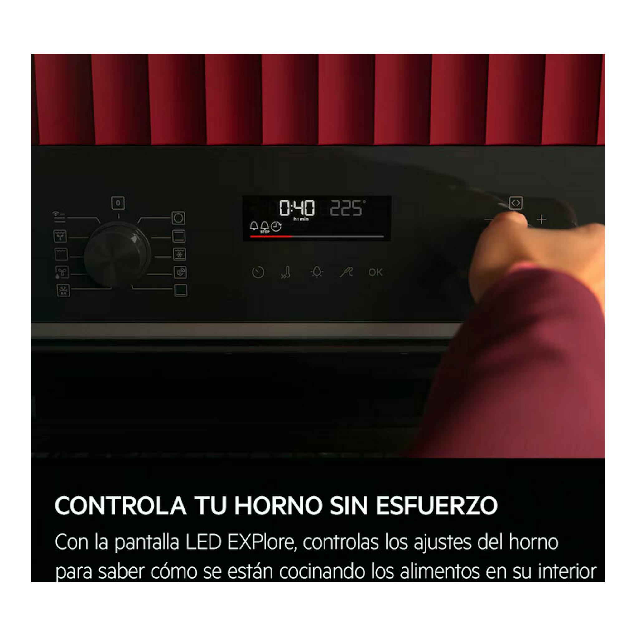 Horno AEG TA5PK401B negro, vista frontal del panel LED con una mano ajustando el control táctil.