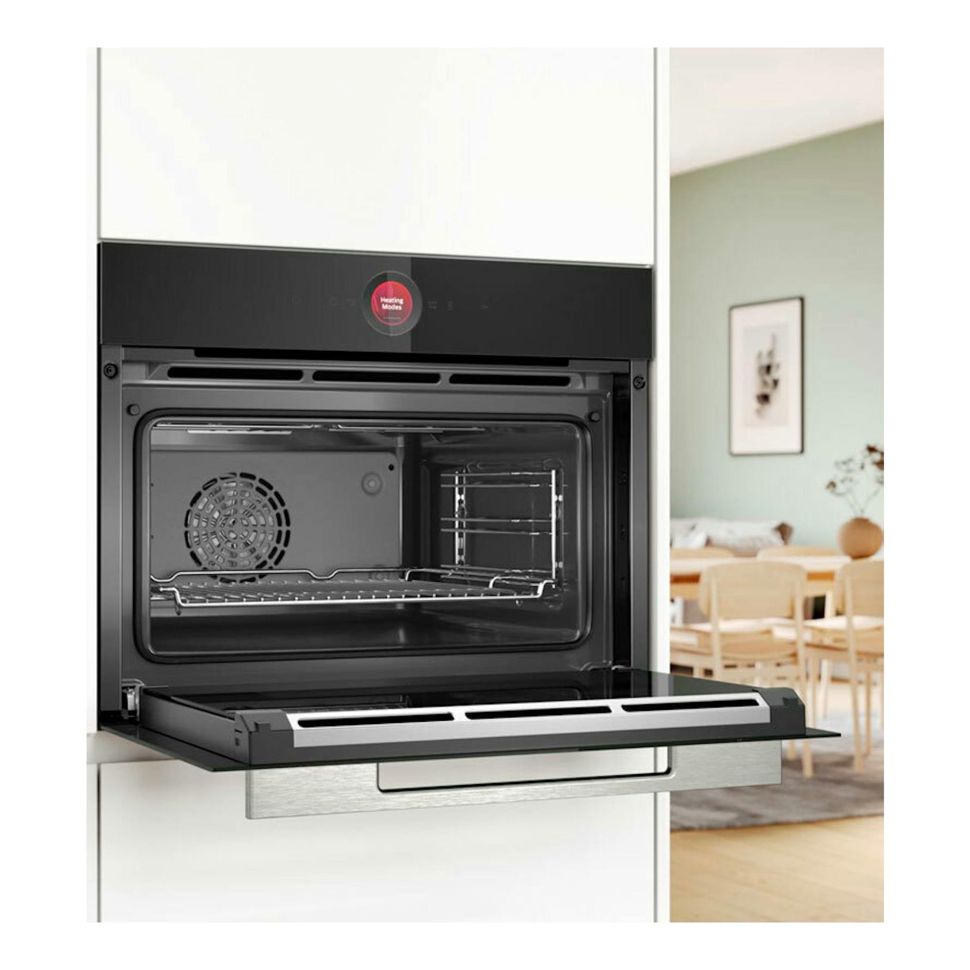 Horno Bosch CBG7341B1 negro empotrado, con la puerta abatible abierta y el interior visible.
