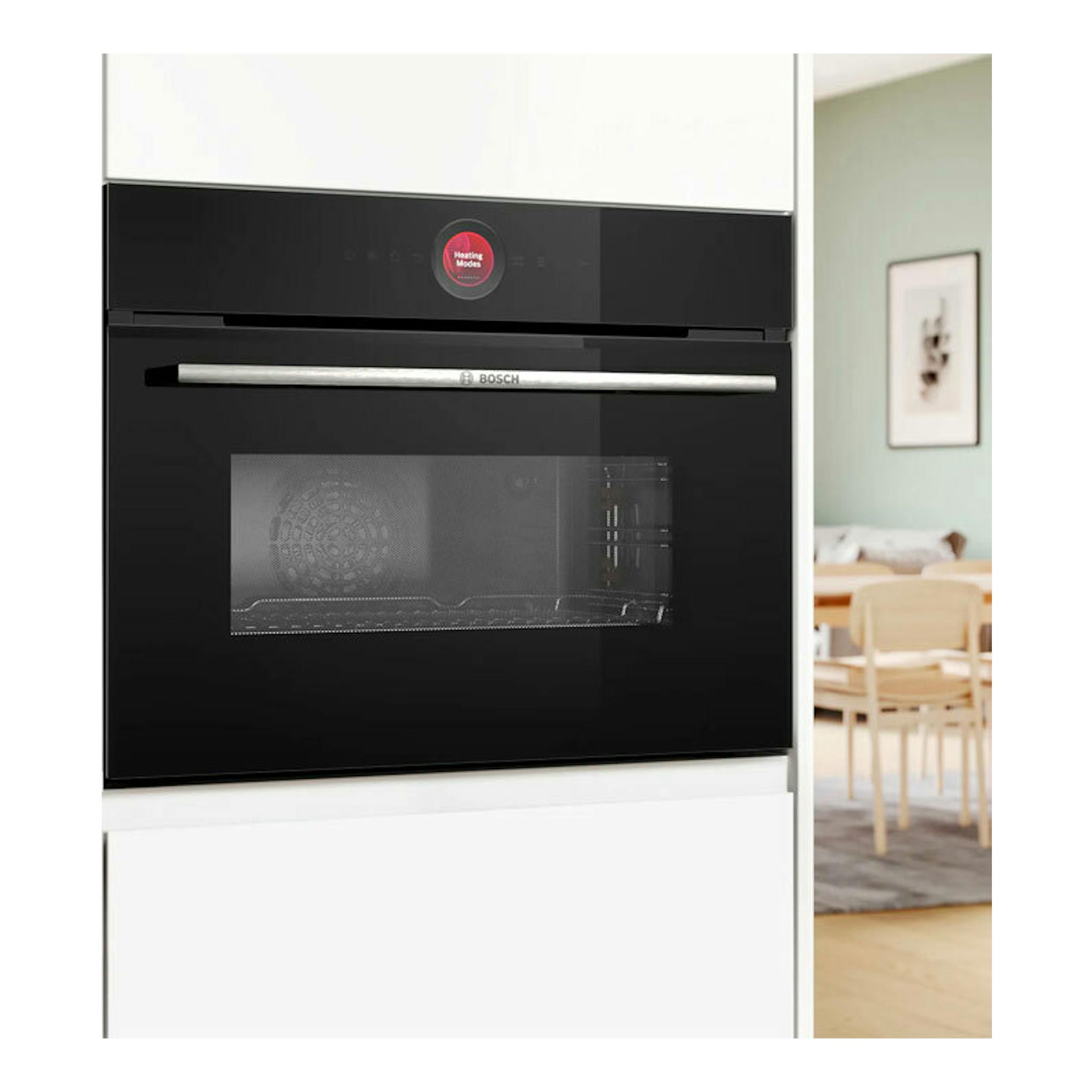 Horno Bosch CMG7241B1 negro empotrado, vista frontal con puerta de vidrio y panel digital.