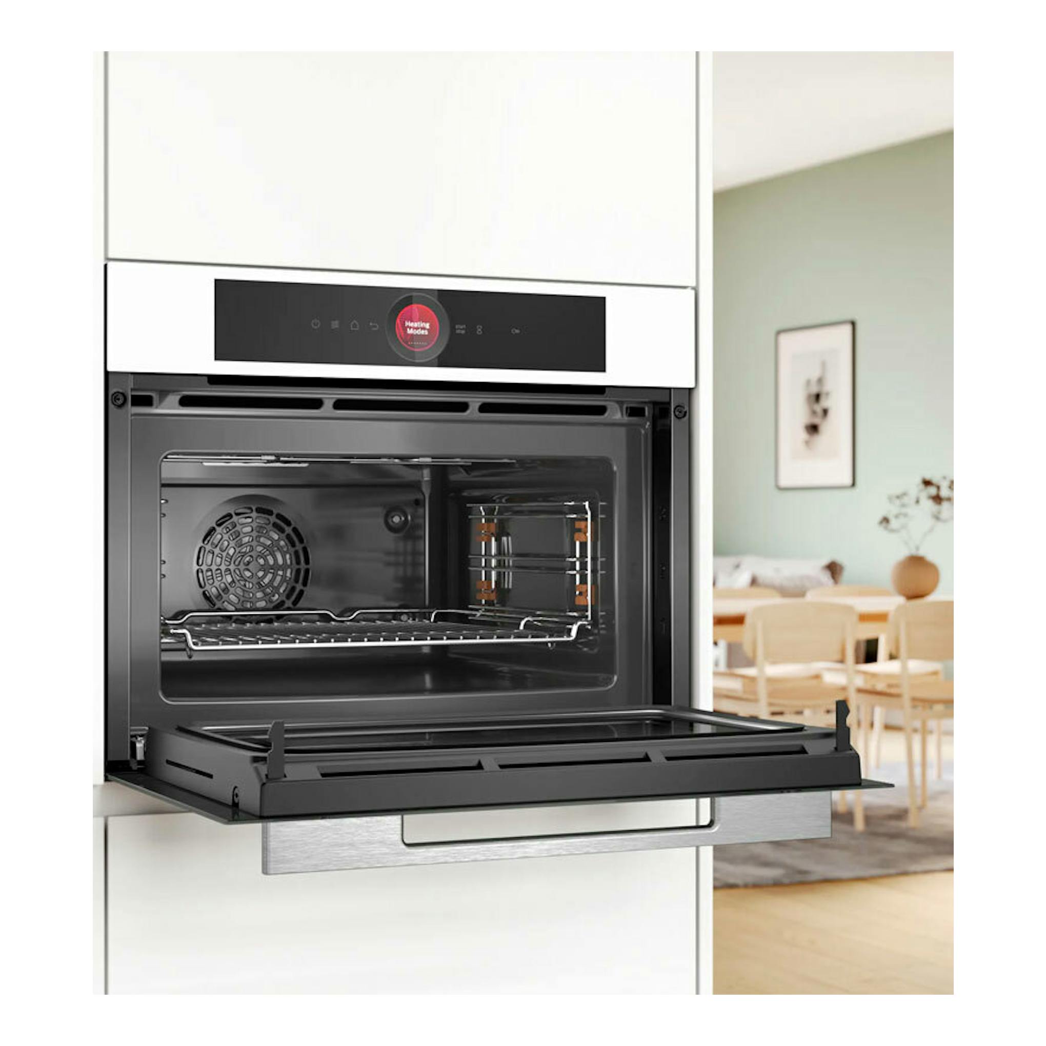 Horno Bosch CMG7241W1 blanco, vista frontal con puerta abatible abierta y cavidad interior visible.