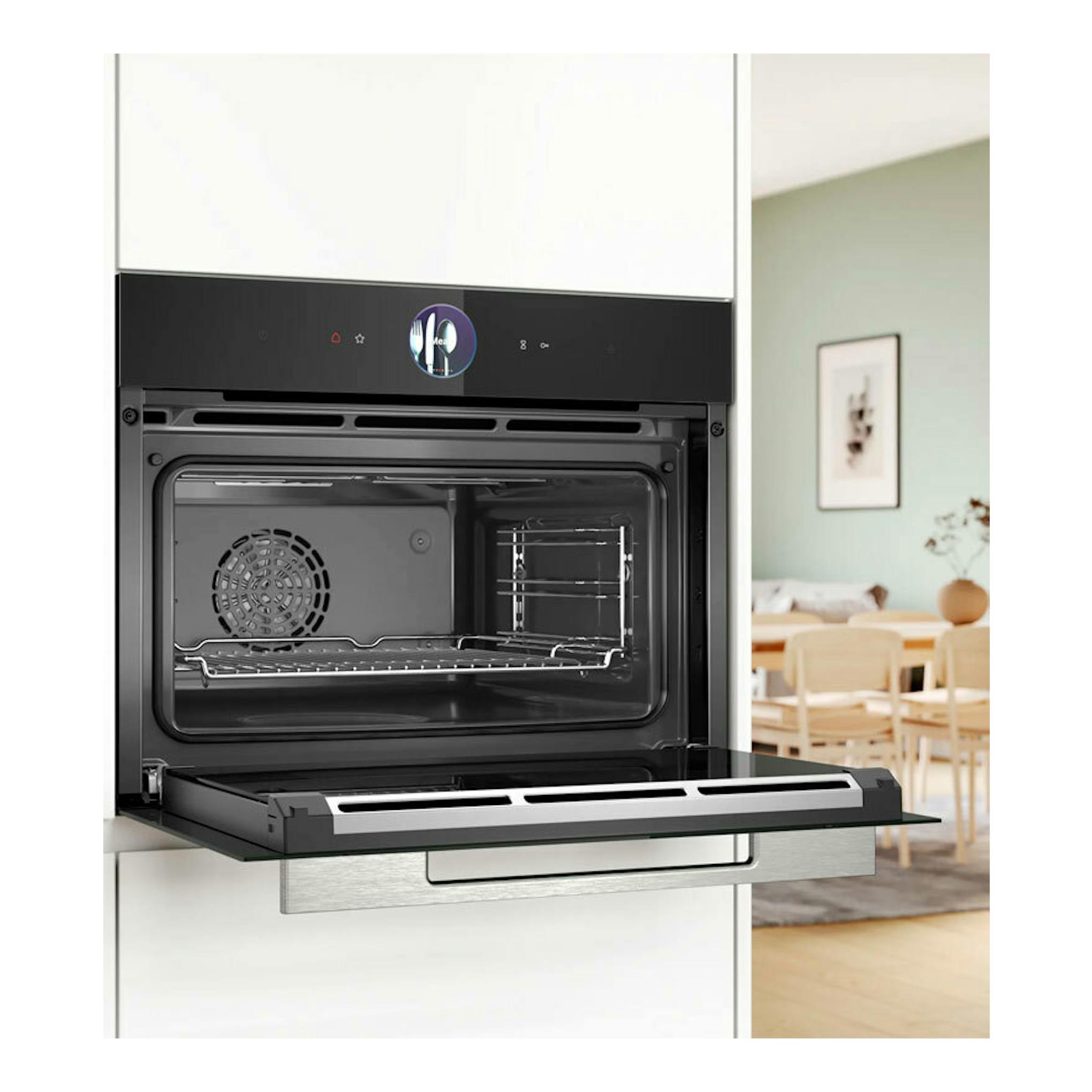 Horno Bosch CSG7361B1 negro empotrado, vista frontal con puerta abatible abierta e interior visible.