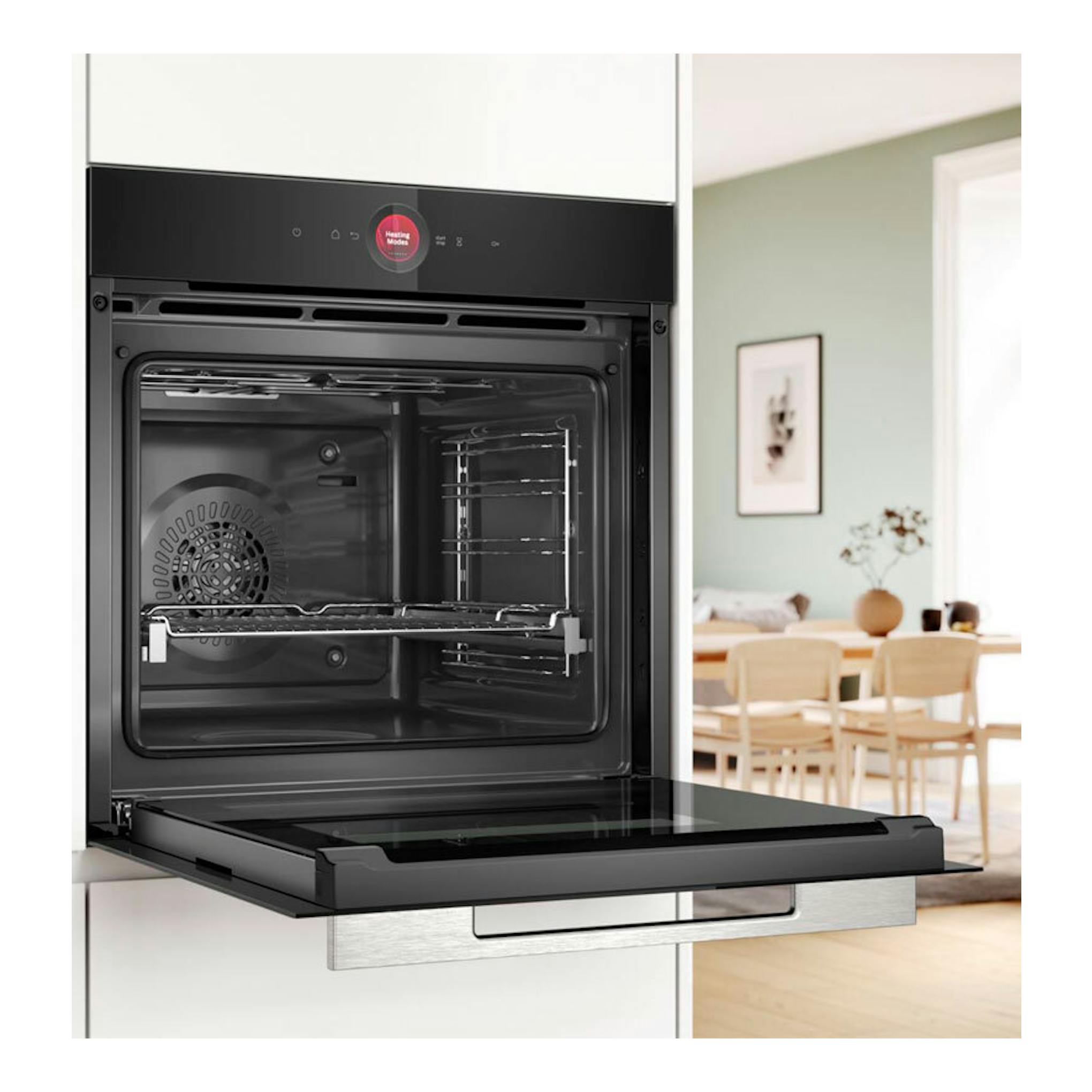 Horno Bosch HBG724AB1 negro, vista frontal con la puerta abatida y el interior visible.