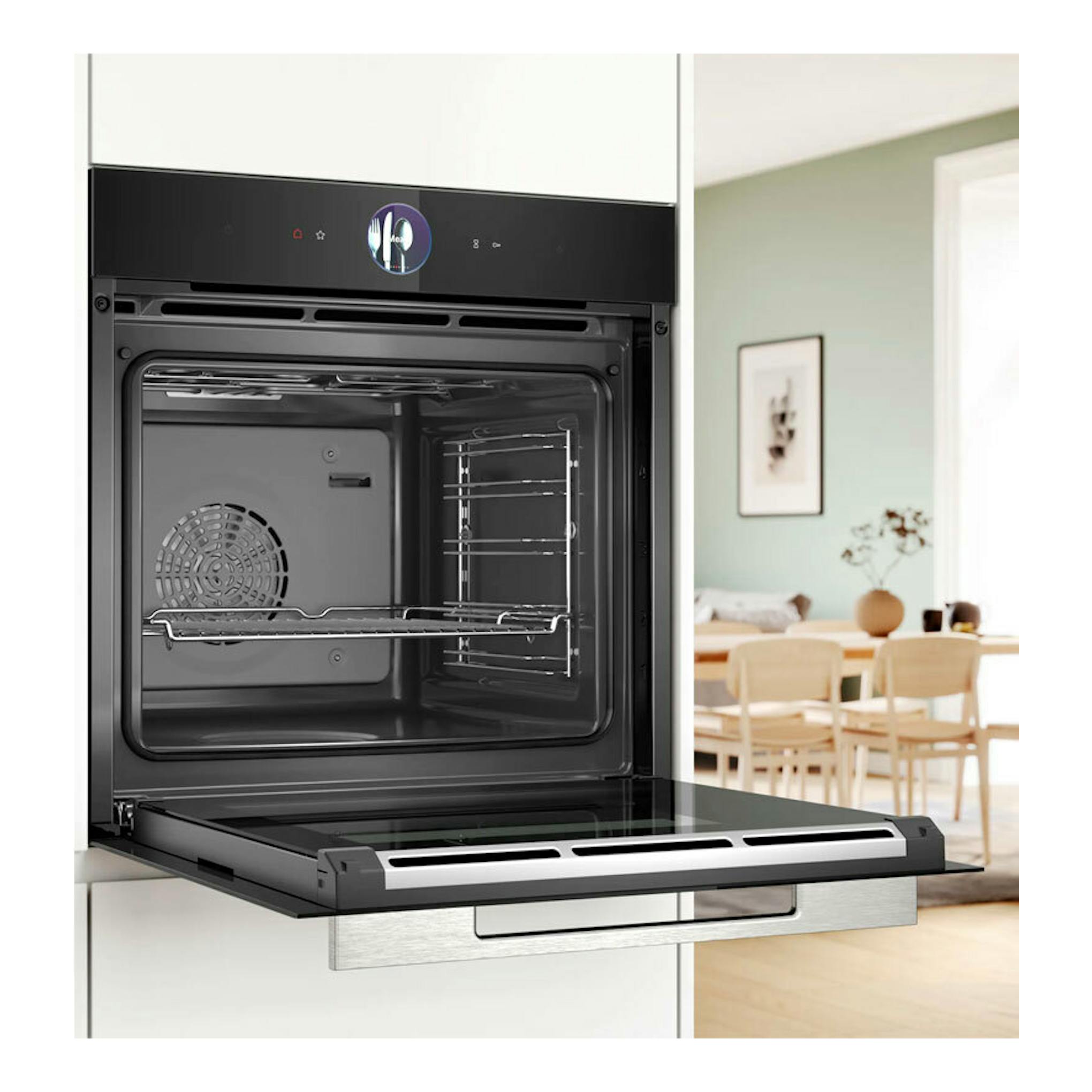 Horno Bosch HSG7361B1 negro, vista frontal, con la puerta abatible abierta y el interior visible.