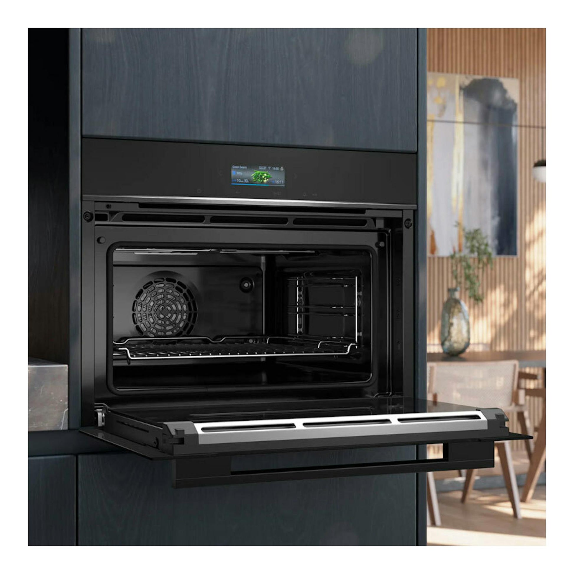 Horno empotrado Siemens CB774G1B1 negro, vista frontal con la puerta abatible abierta.